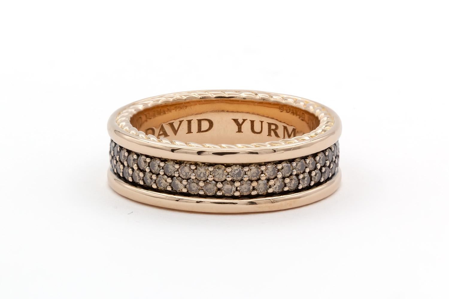We are pleased to offer this David Yurman Streamline 2 Row Mens Band Ring. Featuring David Yurmans classic cable design this ring is fashioned from 18k rose gold and set with 1.37ctw round brilliant cut cognac diamonds. The ring measures 6.5mm wide