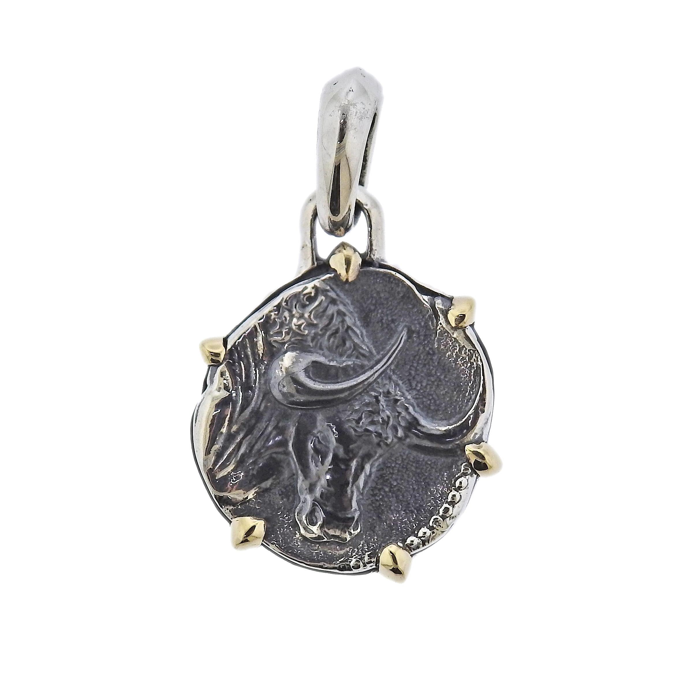 David Yurman sterling silver and 18k gold Taurus Zodiac pendant. Retail $550. Pendant is 33mm with bale x 20mm. Weight - 5.9 grams. Marked: D.Y., 925, 750.