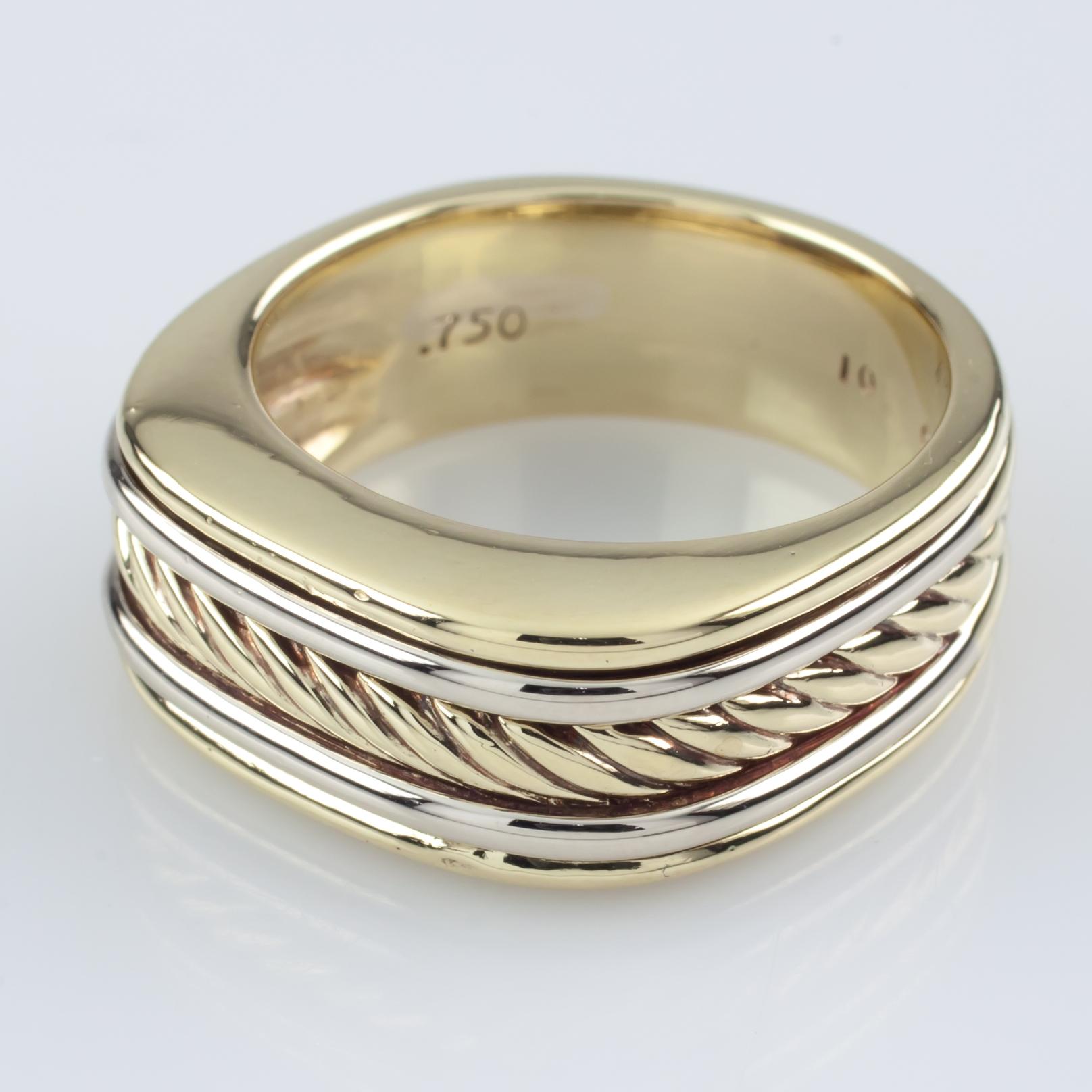 Gorgeous 18k White and Yellow Gold Thoroughbred Cigar Ring
Slightly Rounded Shoulders
Features White Gold Borders around Yellow Gold Center Cable
Width = 9 mm
Size = 9.75
Total Mass = 16.3 grams