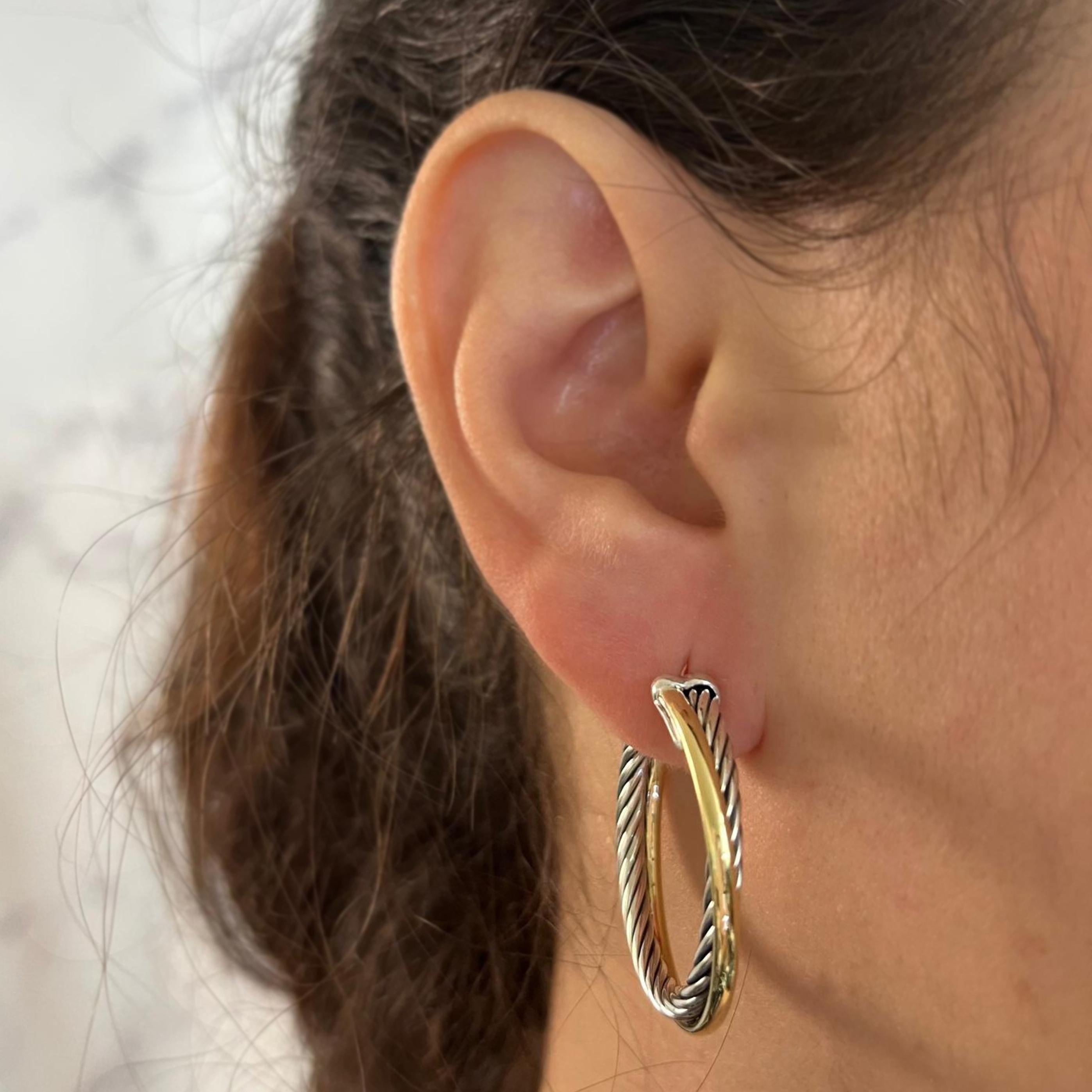 David Yurman 18 Karat Yellow Gold and Sterling Silver Crossover Hoops. 1.25 Inch (30mm) Diameter. Post with Large Friction Back. $995 MSRP. Includes David Yurman travel pouch.