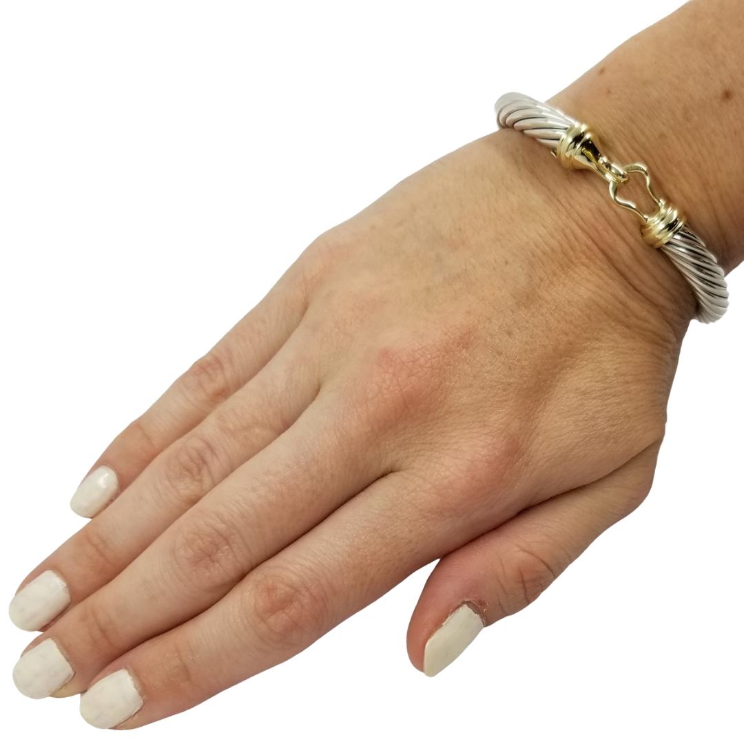 David Yurman Hook Bangle Bracelet Crafted in Sterling Silver and 18 Karat Yellow Gold. 
Professionally Polished to Remove Scratches. Comes with Yurman Pouch and Polishing Cloth. Original MSRP $1,475.