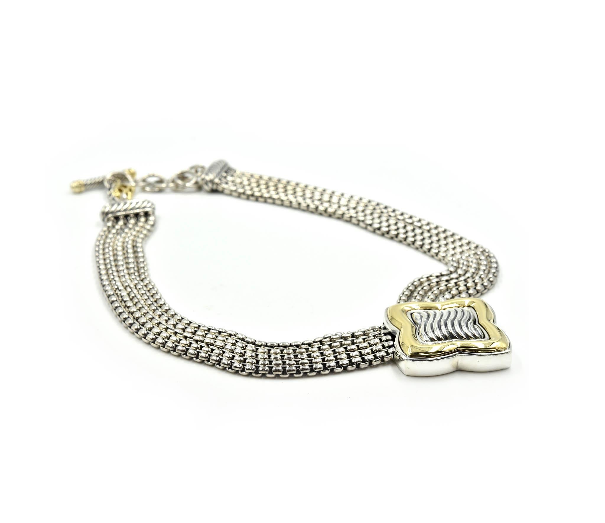 
Amazing craftsmanship by designer David Yurman! This necklace consists of multiple strands of sterling silver box links. Each row of links consists of five high polished box chains. Once the 17” inches of sterling silver completes there is a toggle