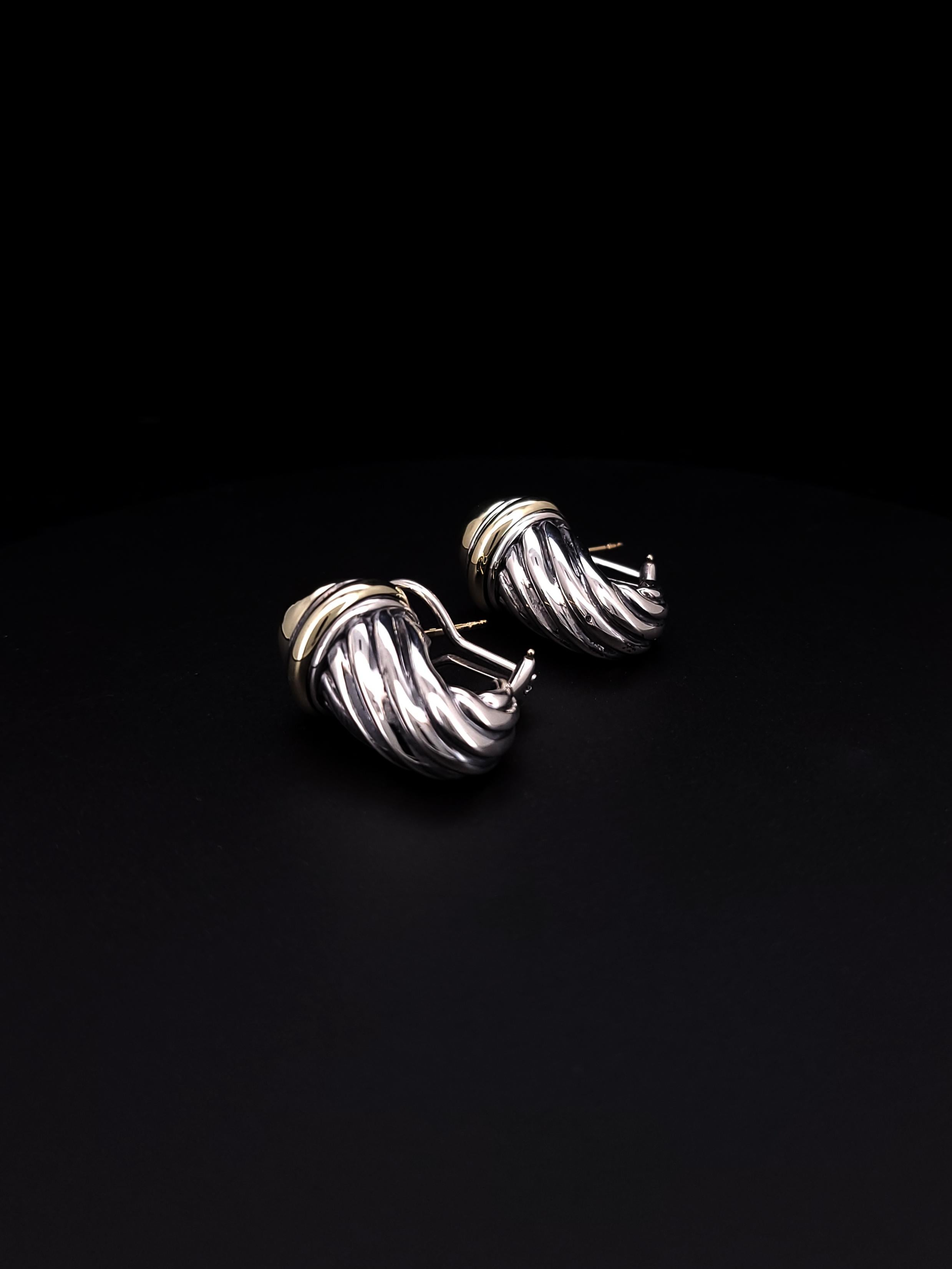 This is an authentic pair of DAVID YURMAN Sterling Silver 14K Gold Thoroughbred Shrimp Earrings. The earrings are crafted of sterling silver and 14 karat yellow gold accents.

Dimensions: 27.8mm x 15mm
Weight: 18.4 grams
Condition: Few scratches,