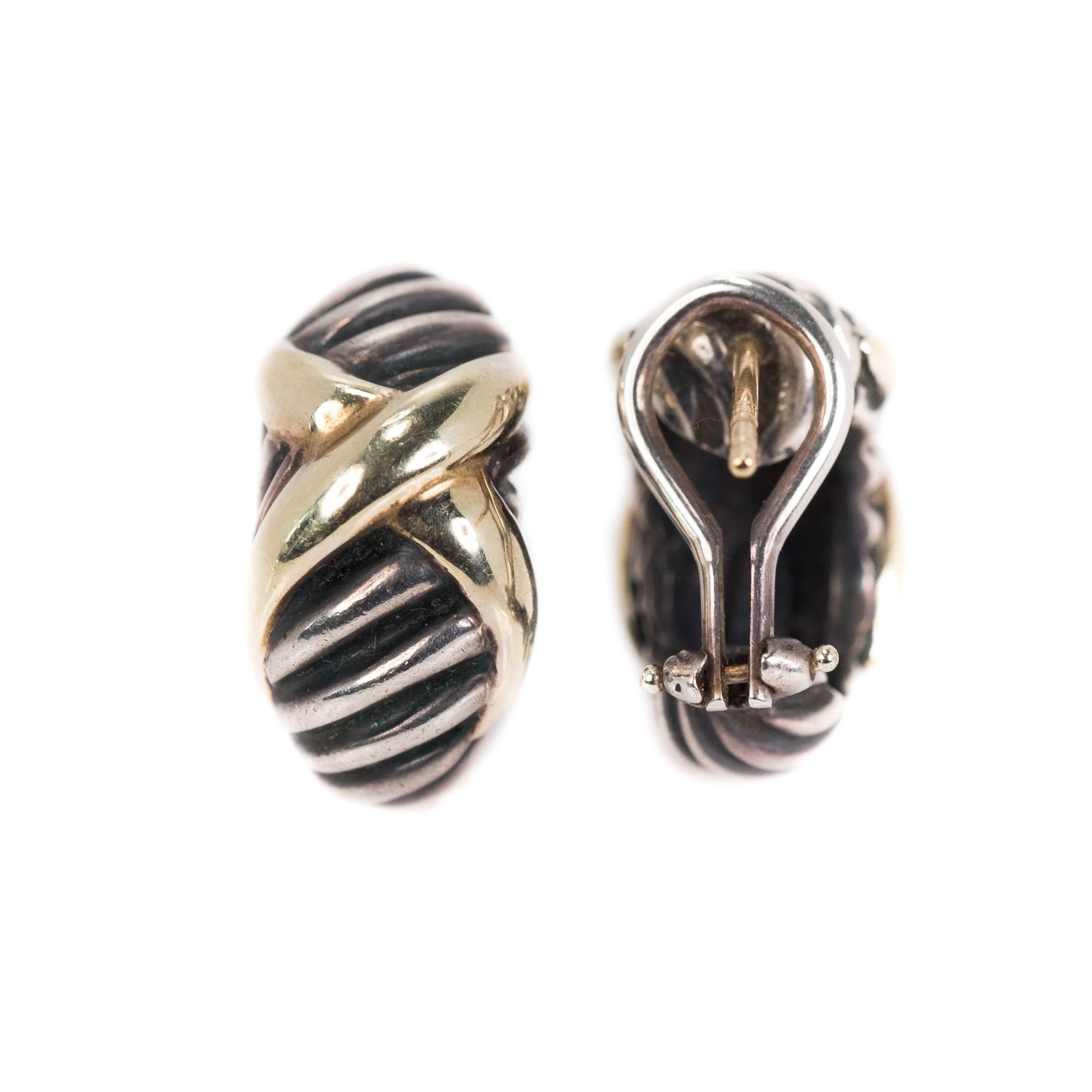 David Yurman X Cable Earrings - Sterling Silver, 14k Yellow Gold

Features Sterling Silver single Rope Cable Design with a 14k Yellow Gold X accent. 
These huggie earrings have 14k Yellow Gold posts. The Sterling Silver Omega backs provide extra