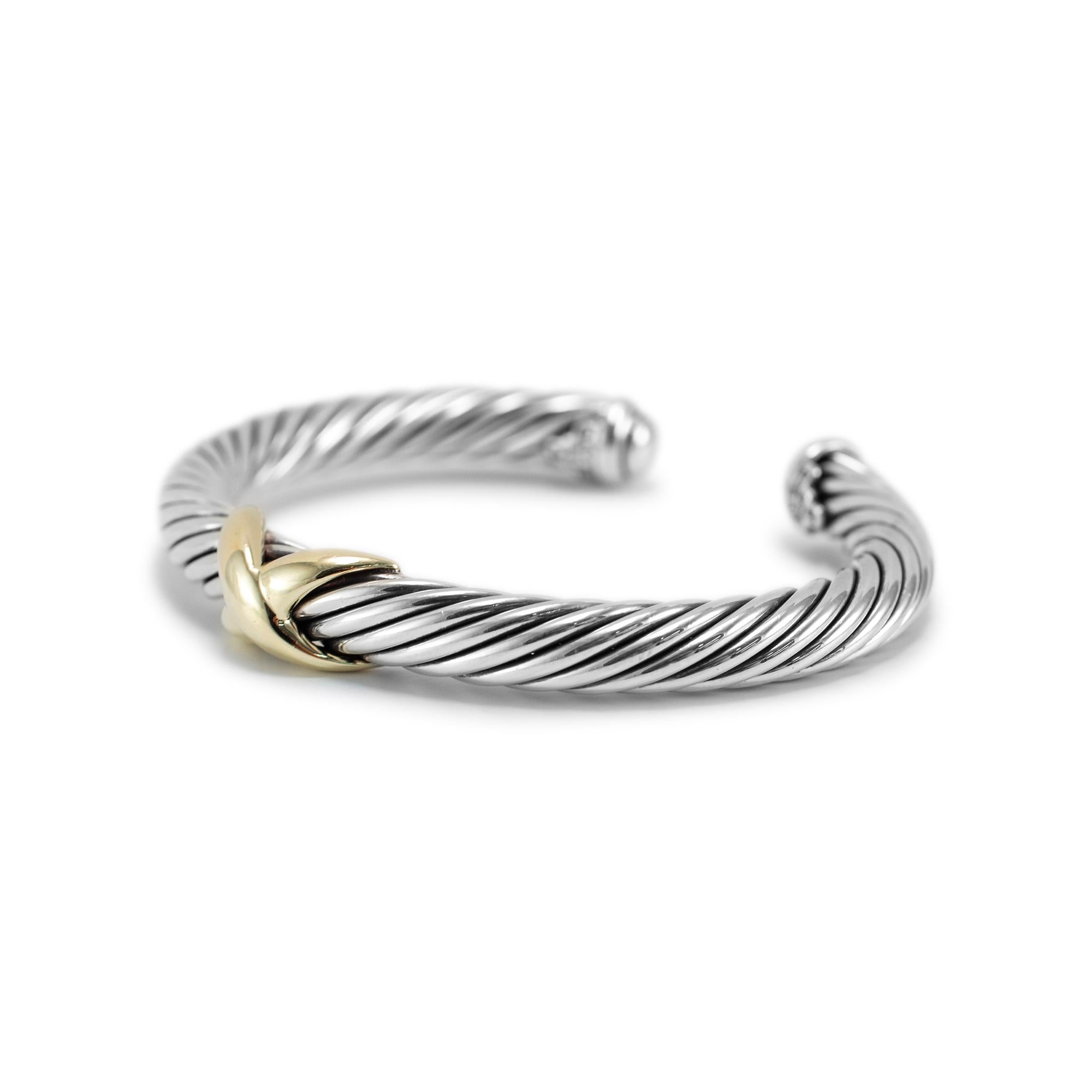 Brand: David Yurman

Gender: Ladies

Metal Type: 925 Sterling Silver & 14k Yellow Gold

Length: 6.50 inches

Width: 7.00 mm

Weight: 43.06 grams

Ladies silver and 14K yellow gold cuff bracelet. The metals were tested and determined to be 925