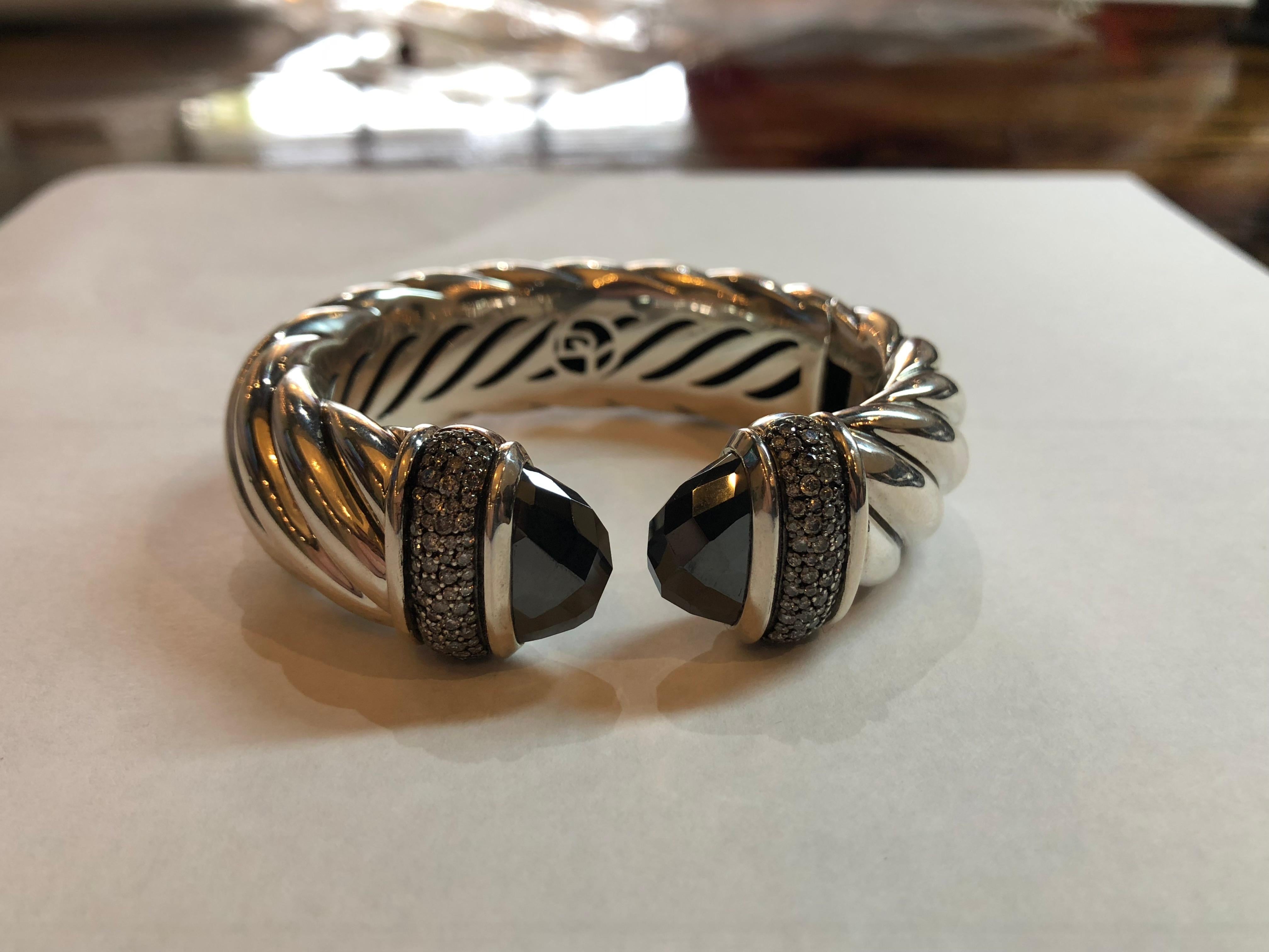 David Yurman Waverly Bracelet Cuff 1.19 cts Diamonds with Hematite Ends
Retail $3500.00
Weighs 69 grams 
Signed D.Y. 925