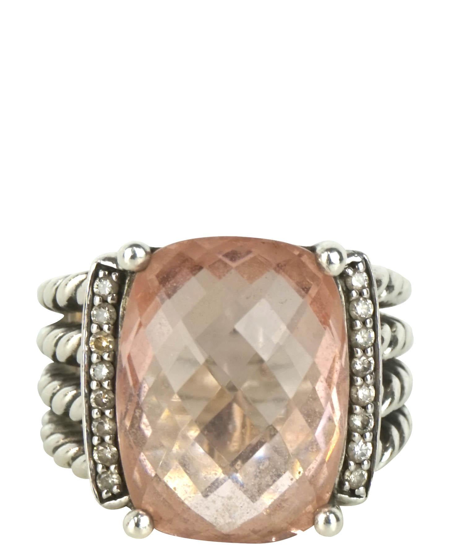 David Yurman Wheaton ring features four cable wrapped sterling silver bands with a faceted morganite stone trimmed by two rows of pave diamonds. US size 6.5. Made in New York, USA. Ring is in excellent condition. Makers mark: DY, 925.

From David