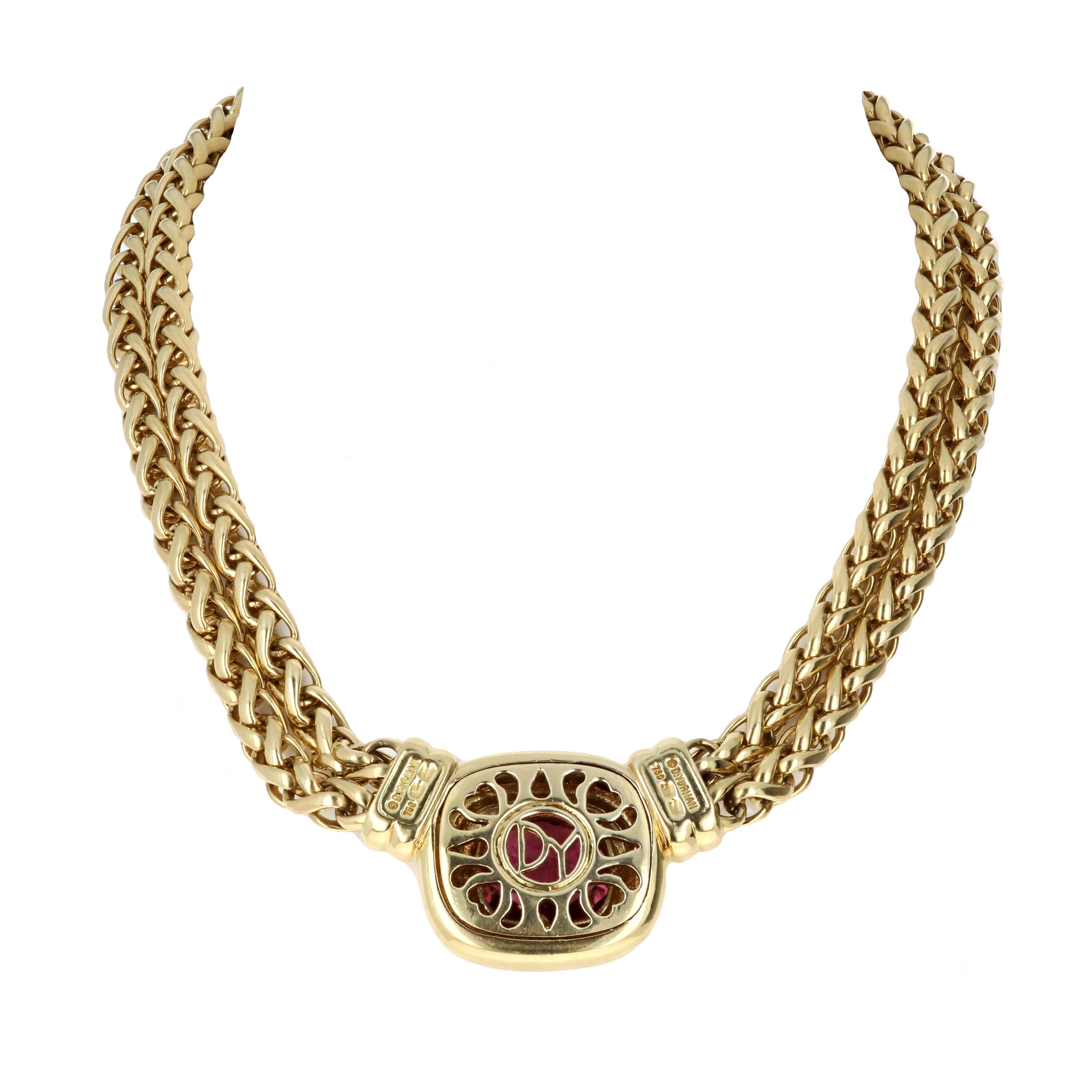 Authentic David Yurman double wheat chain pink tourmaline necklace. This necklace is from the Albion collection. The necklace is a large woven link double chain made in 18 karat yellow gold and has a large lobster clasp closure. The center pendant