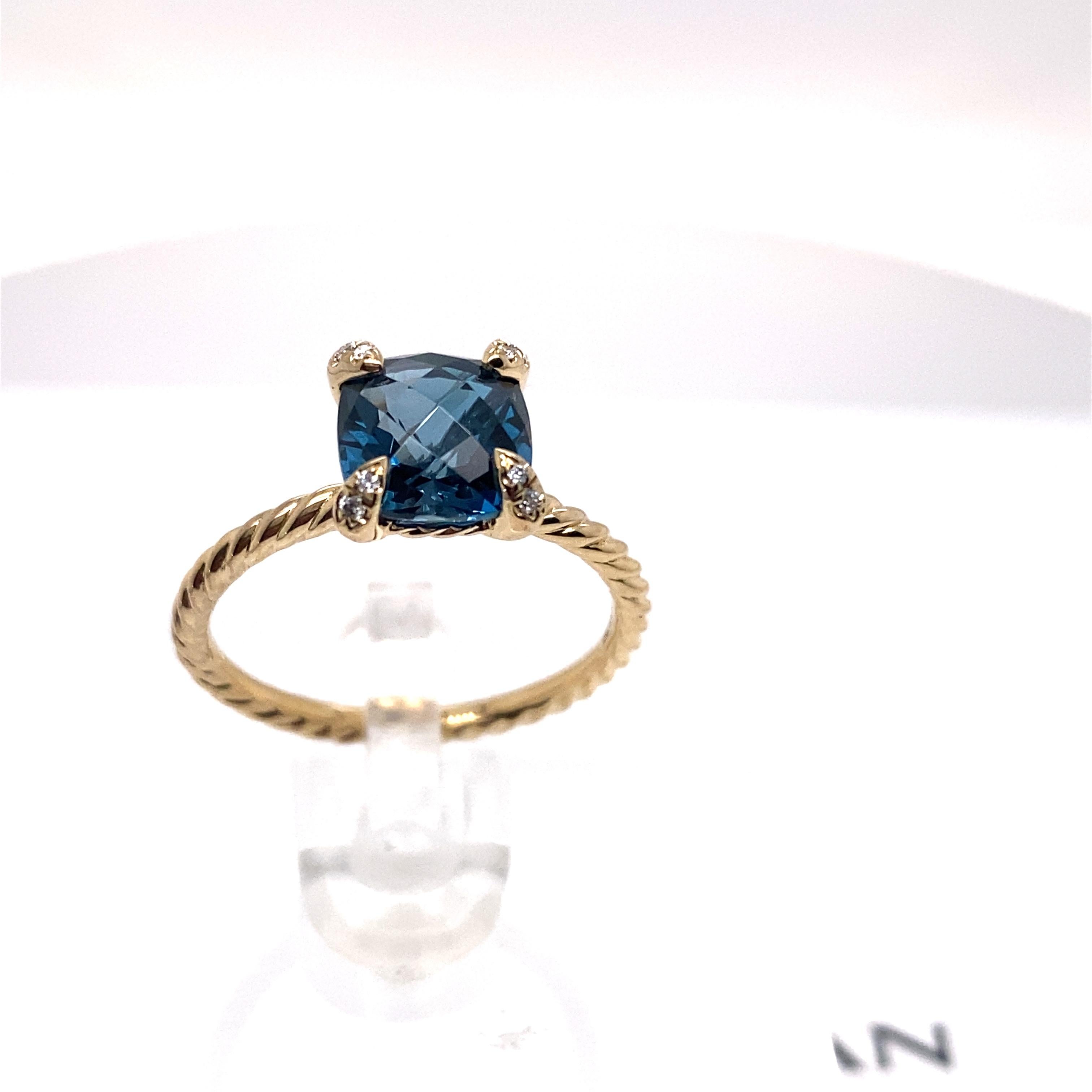 David Yurman Chatelaine Ring with Hampton Blue Topaz and Diamonds 
Style:  Prong Set
Ref. number:  R12598D88AIBDJ6
Metal:   18kt Yellow Gold
Size:  6 
Measurements:  7 MM
Main Stone:  Hampton Blue Topaz
Accent Diamonds:  8 Round Brilliant Diamonds