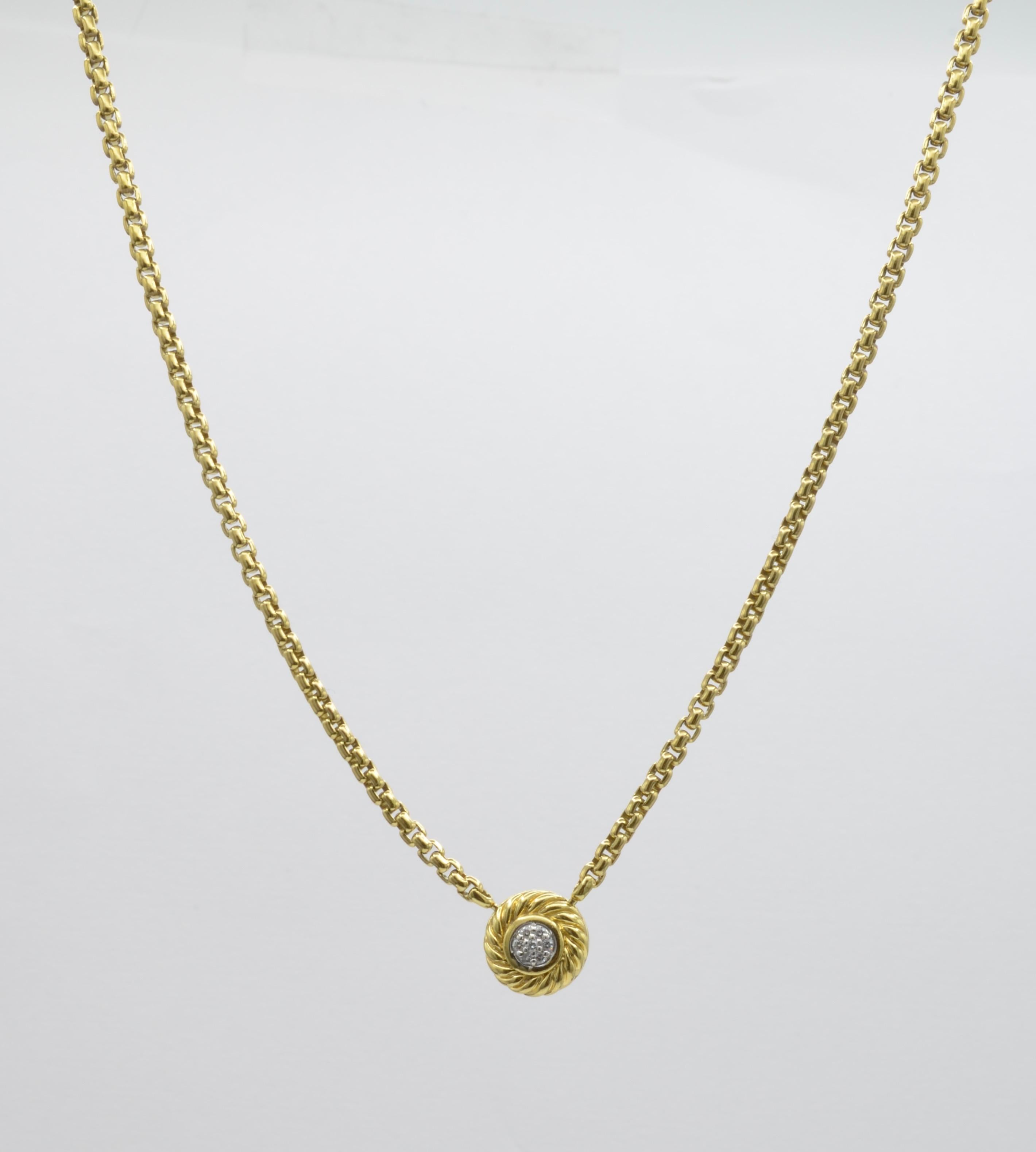 This David Yurman Cookie Necklace spirals around 0.10 carats of pave diamonds on a rounded cable chain in elegant 18K Yellow Gold. The chain is attached to the pendant as a swivel so the chain never gets twisted! The signature box chain is weighty