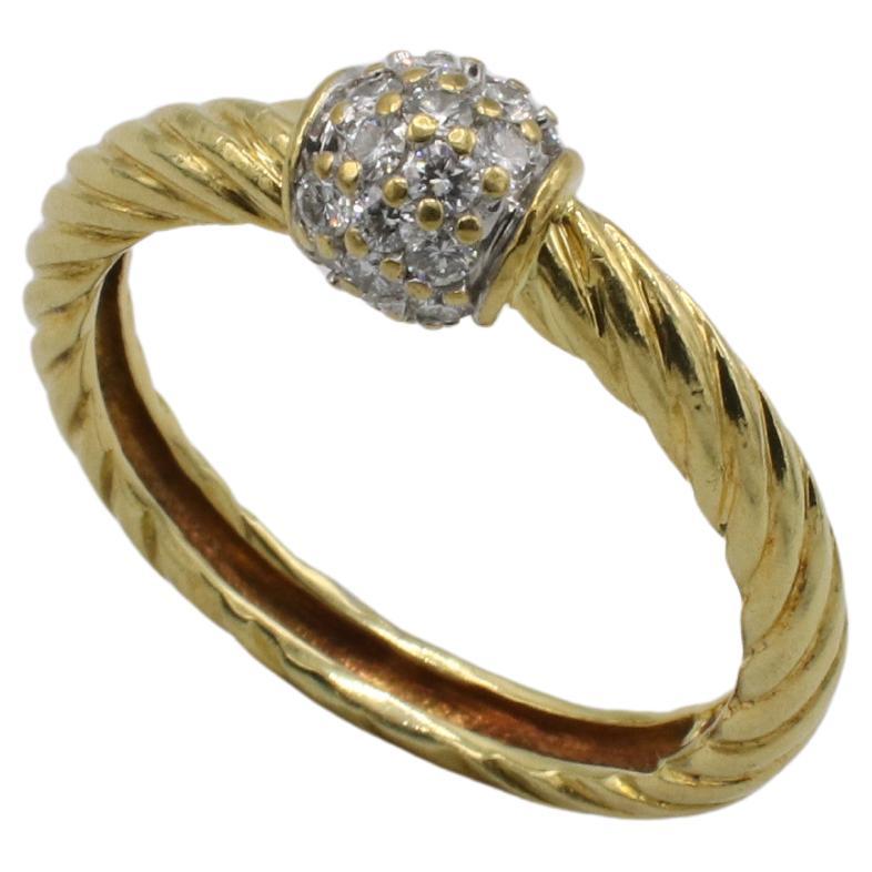 David Yurman Yellow Gold Petite Solari Station Natural Diamond Dome Ring 
Metal: 18k yellow gold
Weight: 4.34 grams
Diamonds: 0.21 total carat weight F-G VS
Size: 7 (US)
Band: 2.5mm
Signed: ©D.Y. 750 
LDD F35000078
