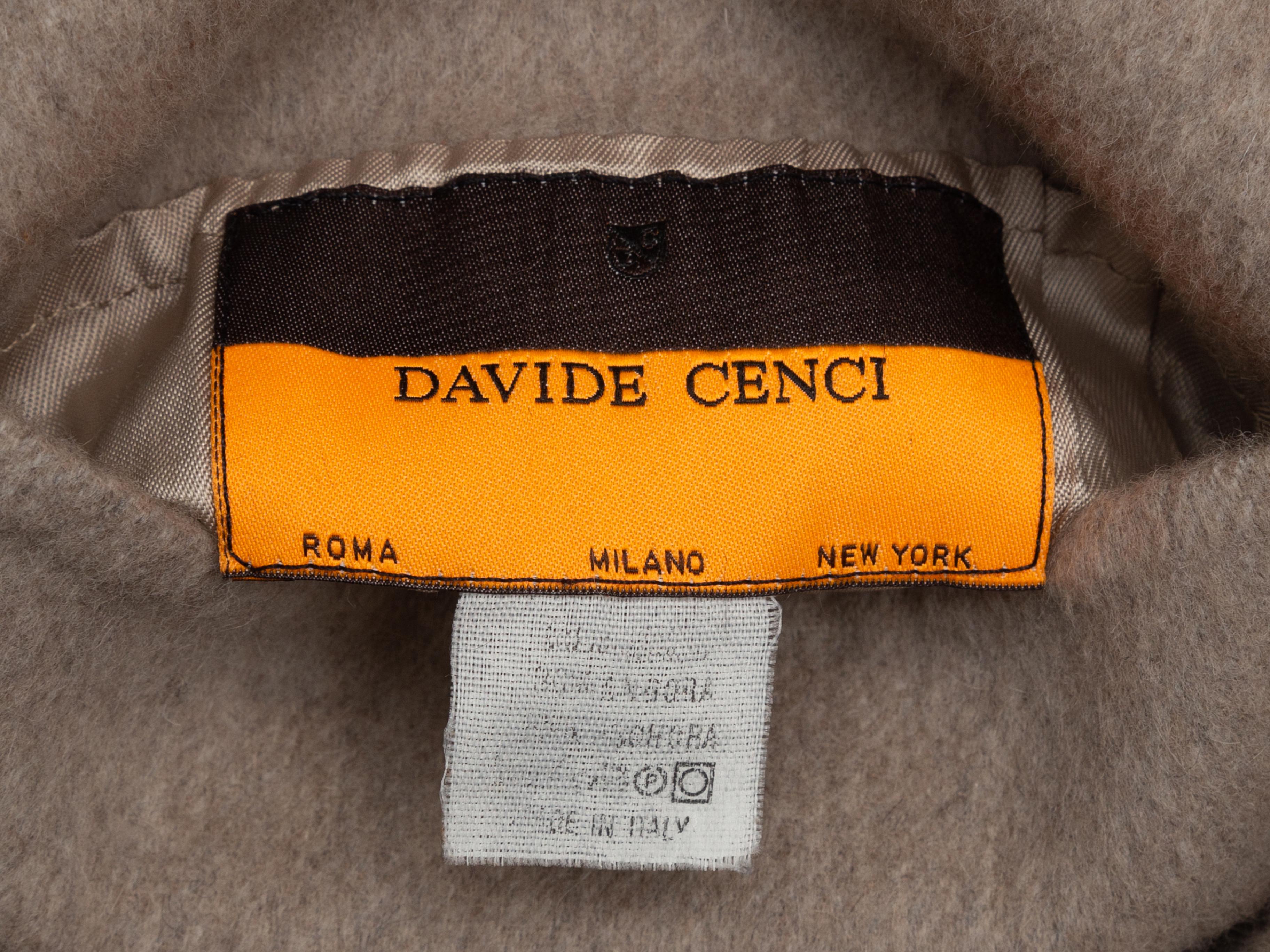Product details: Brown cashmere long fur-trimmed coat by David Cenci. Notched lapel. Dual hip pockets. 44