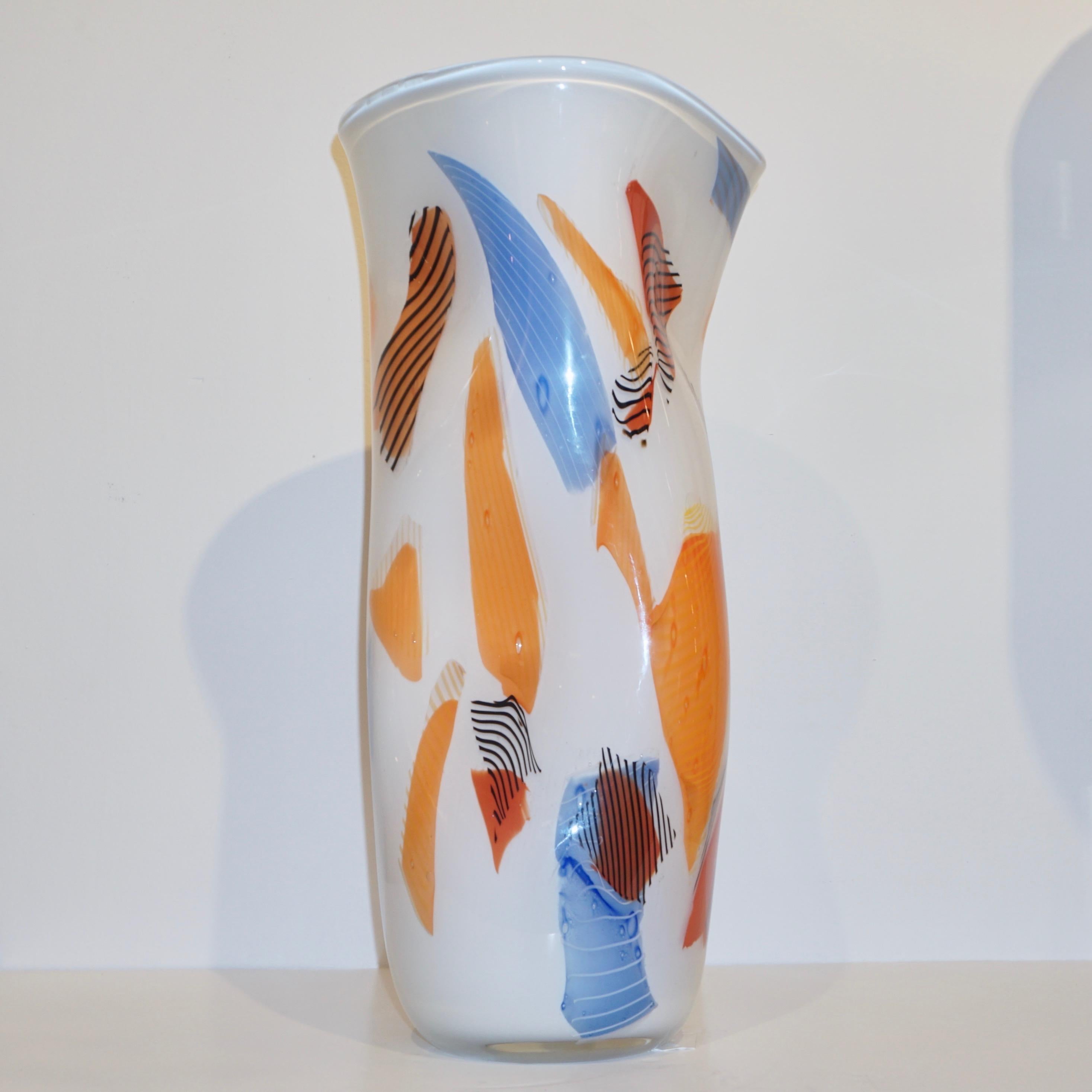 Venetian organic modern vase, contemporary Work of Art signed by Davide Donà in blown Murano Art glass with post modern design. This striking ivory pearl white vase overlaid in crystal Murano glass is beautifully worked with murrine insets in