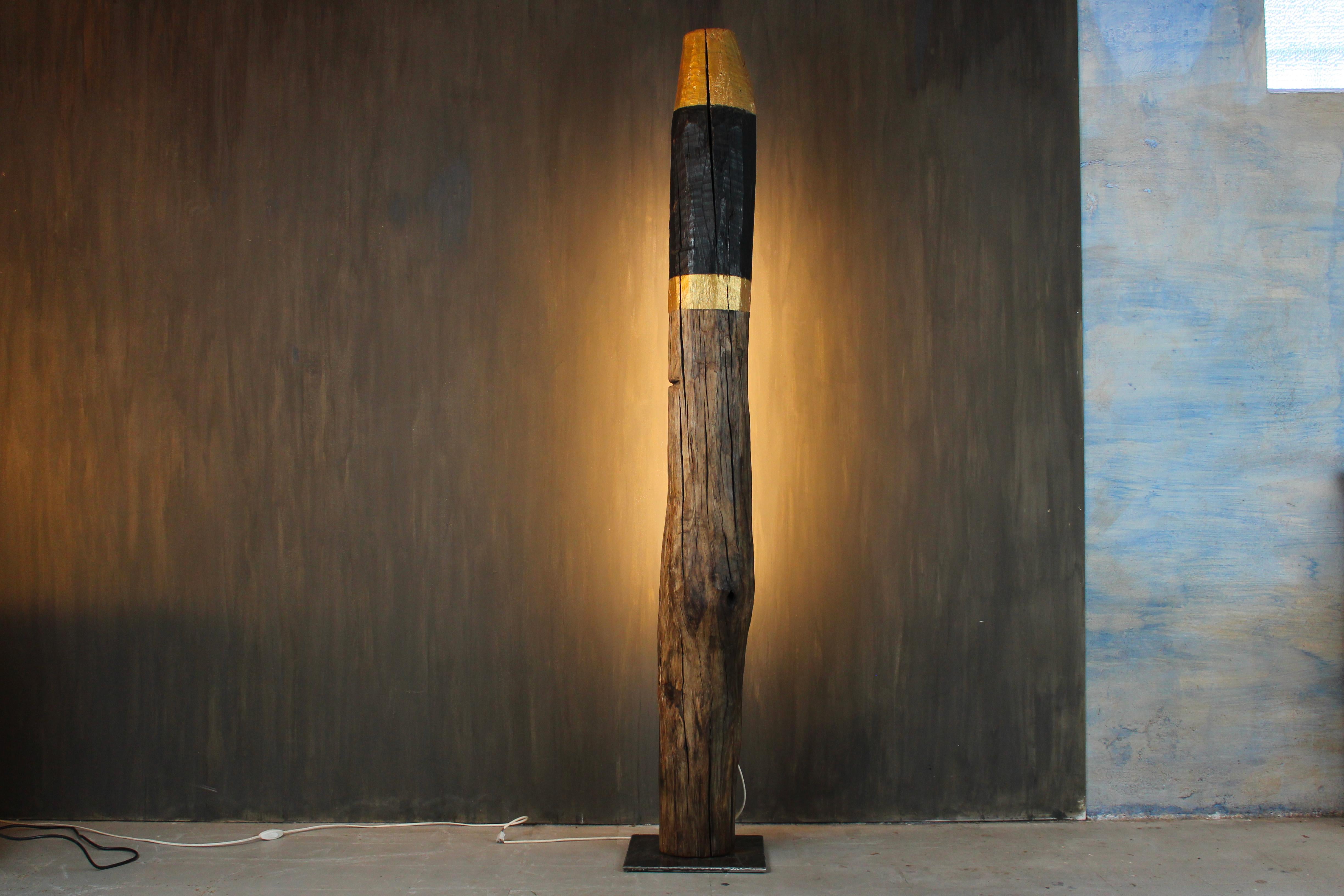 This sculptural floor lamp is handcrafted from an original bricola — the centuries-old oak posts that mark the waterways of the Venice Lagoon. Designed and created by Treviso-based artist Davide Moretto, the piece celebrates the transformation of