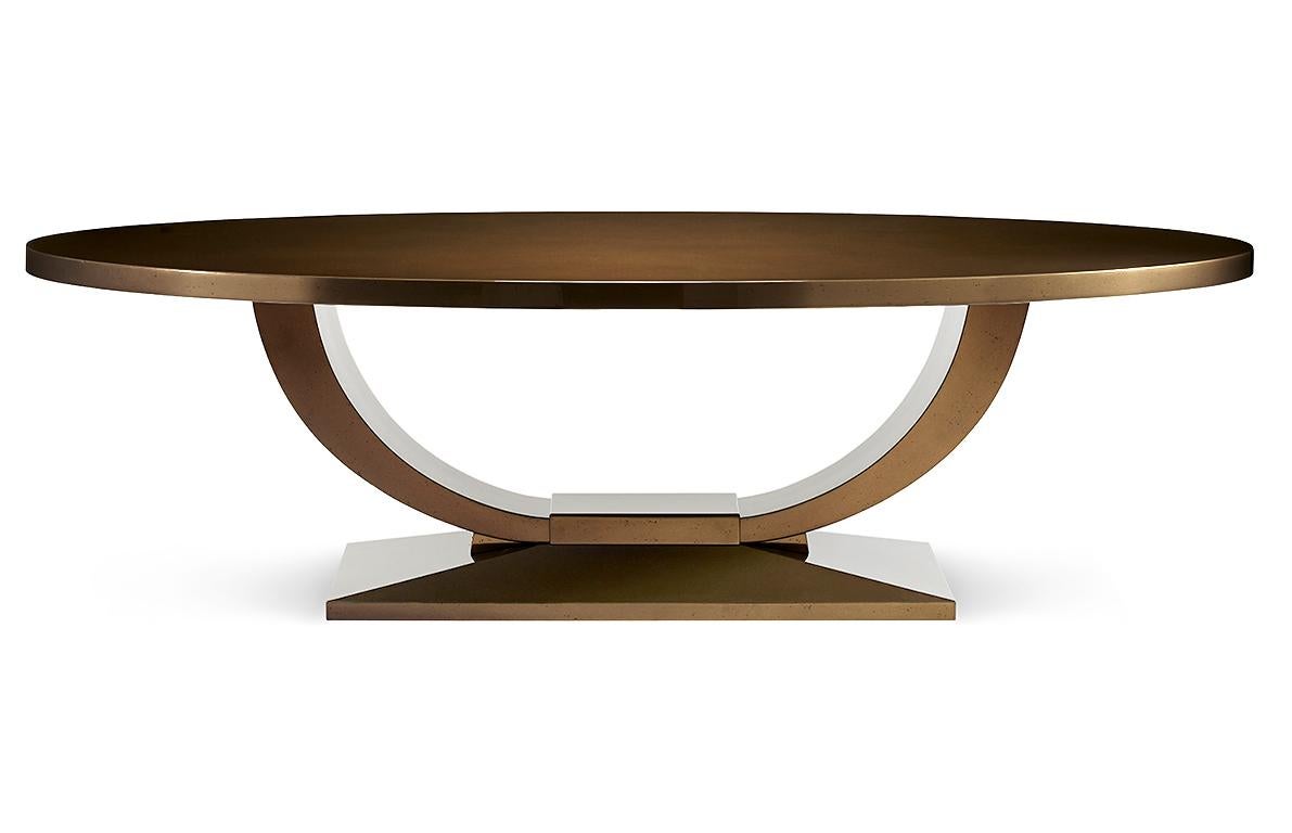 A deluxe oval dining table in a beautiful, rich shade, exuding the utmost style and comfort that's perfect for entertaining.

The table is finished in a high-gloss Macassar ebony, which has been dark-tinted to a shade that is rich and