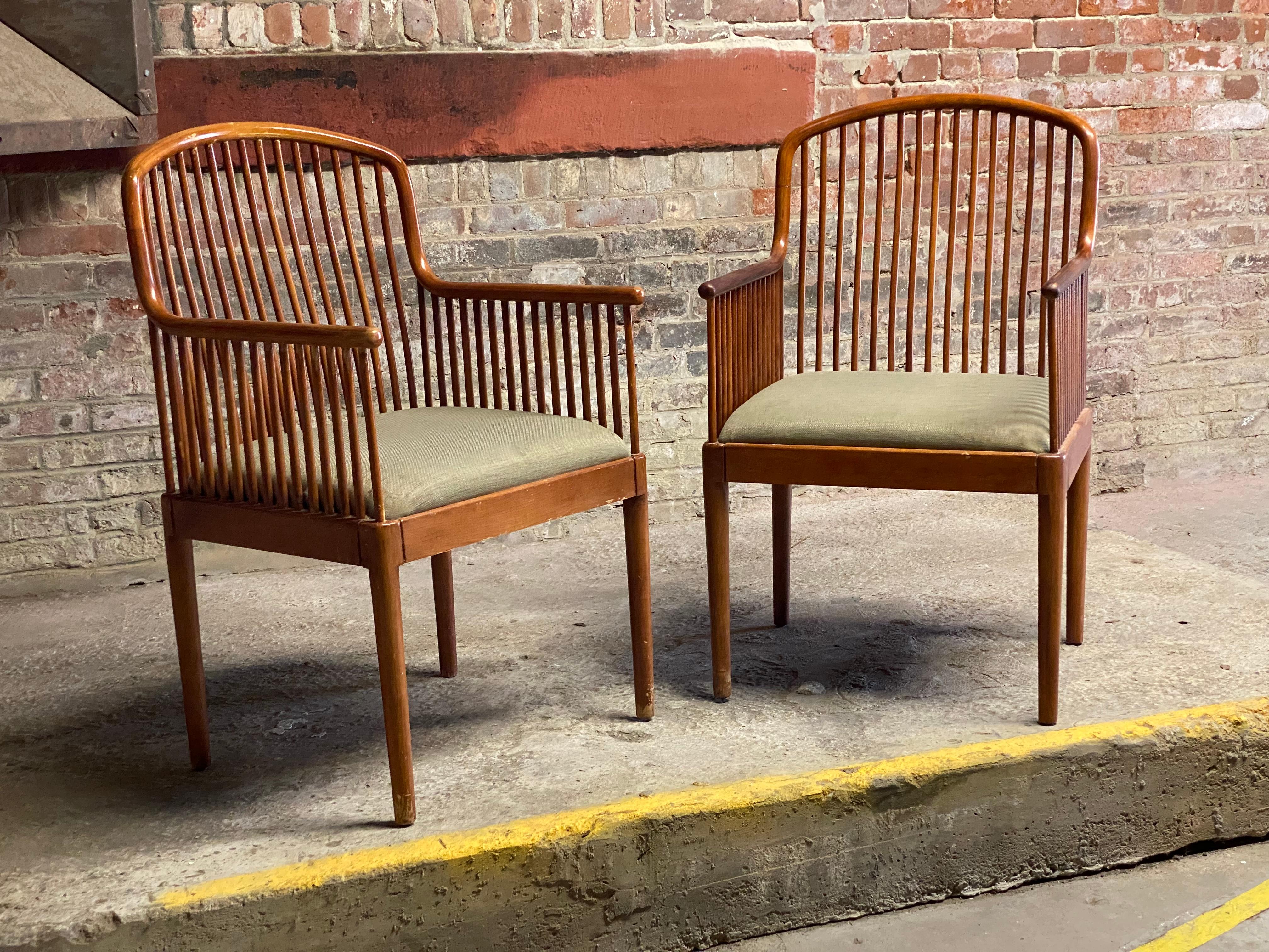 Pair of Davis Allen for Knoll 1983 spindle back armchairs. The Exeter chair embodies design principle of the Austrian Secessionists, American Arts and Crafts and The Bauhaus movement. Fine Post Modern design. Both example are signed with metal tags