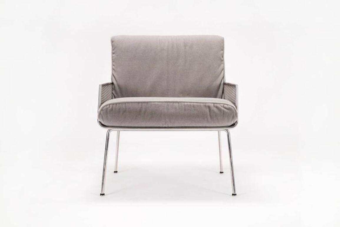 Davis Allen lounge chair from the U.S.Historic Landmark Inland Steel Building in Chicago, chair has loose mohair cushions that rest in the woven stainless steel frame.