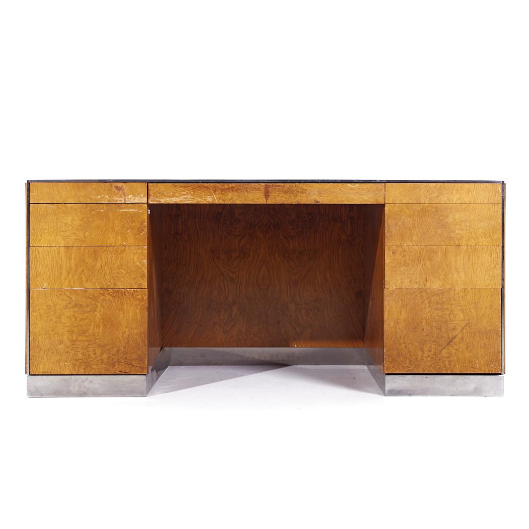 Davis Allen Mid Century Burlwood and Chrome Executive Desk

This desk measures: 65.25 wide x 32.25 deep x 29.25 high, with a chair clearance of 26 inches

All pieces of furniture can be had in what we call restored vintage condition. That means the