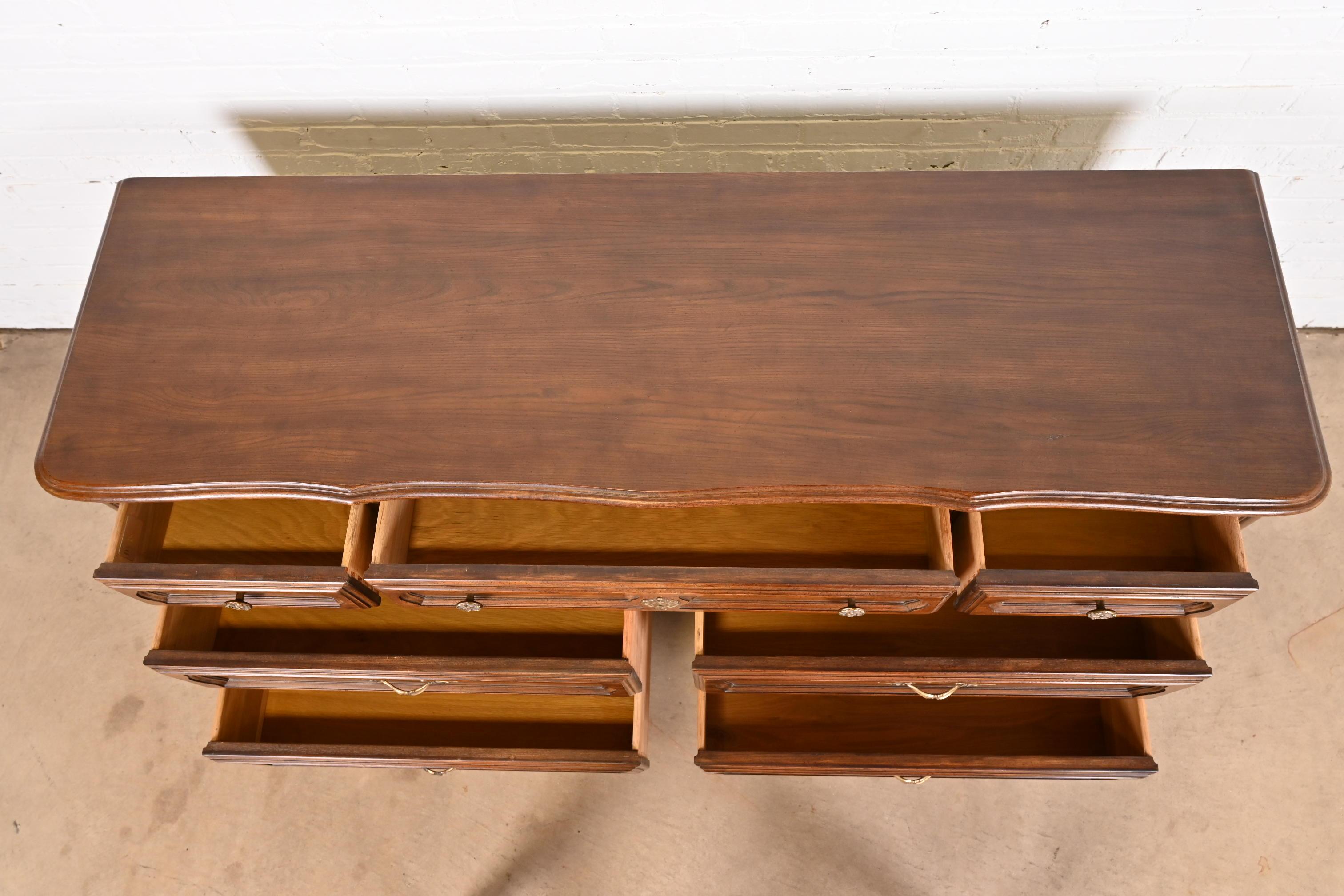 Mid-20th Century Davis Cabinet Company French Provincial Louis XV Carved Oak Dresser For Sale