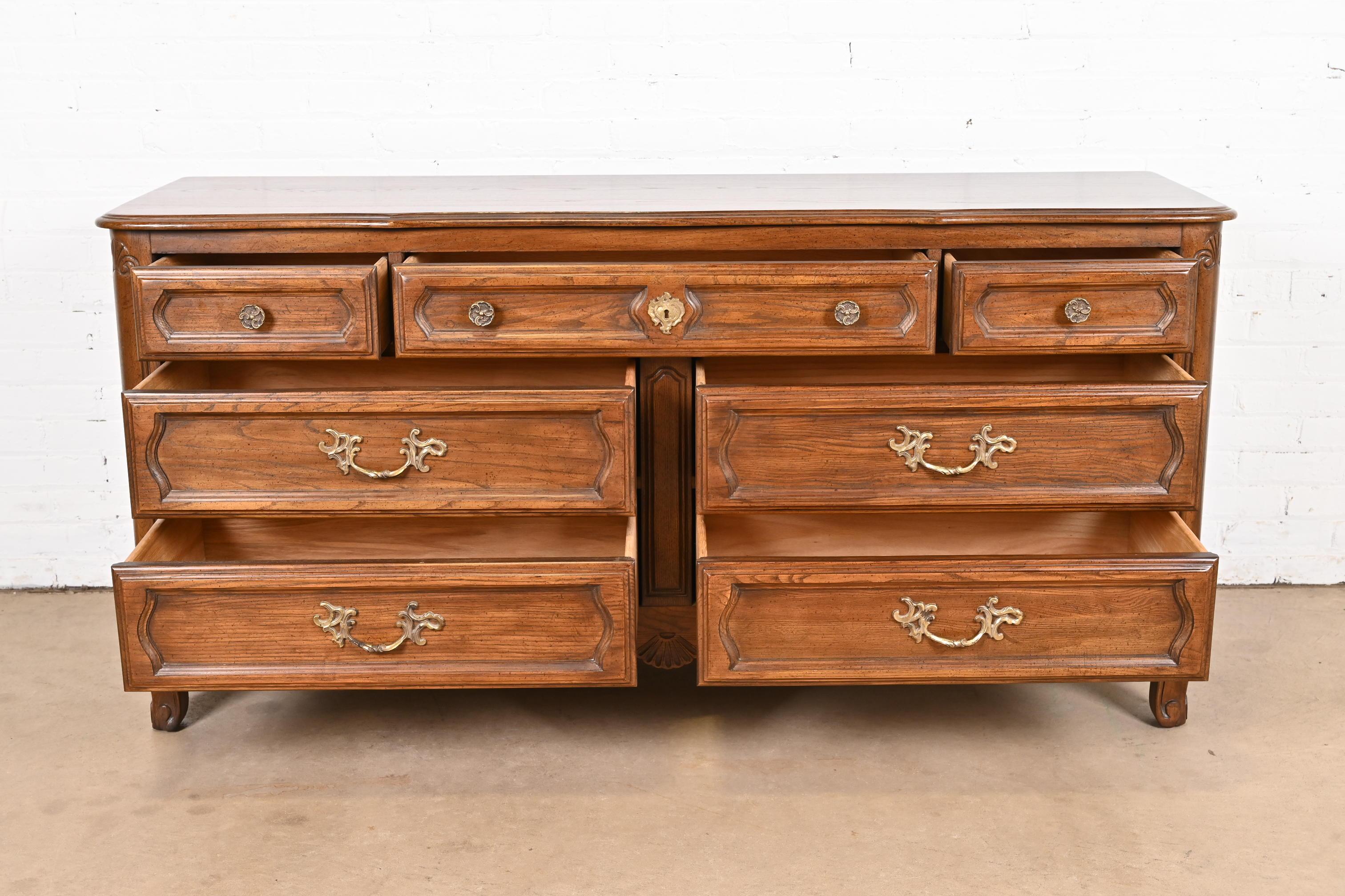 Brass Davis Cabinet Company French Provincial Louis XV Carved Oak Dresser For Sale