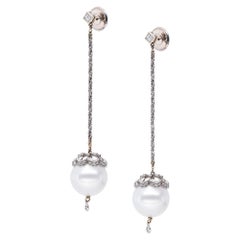 Australian Pearls Long Earrings with an Embroidery of Gold and Diamonds Australian Pearls Long Earrings with an Embroidery of Gold and Diamonds