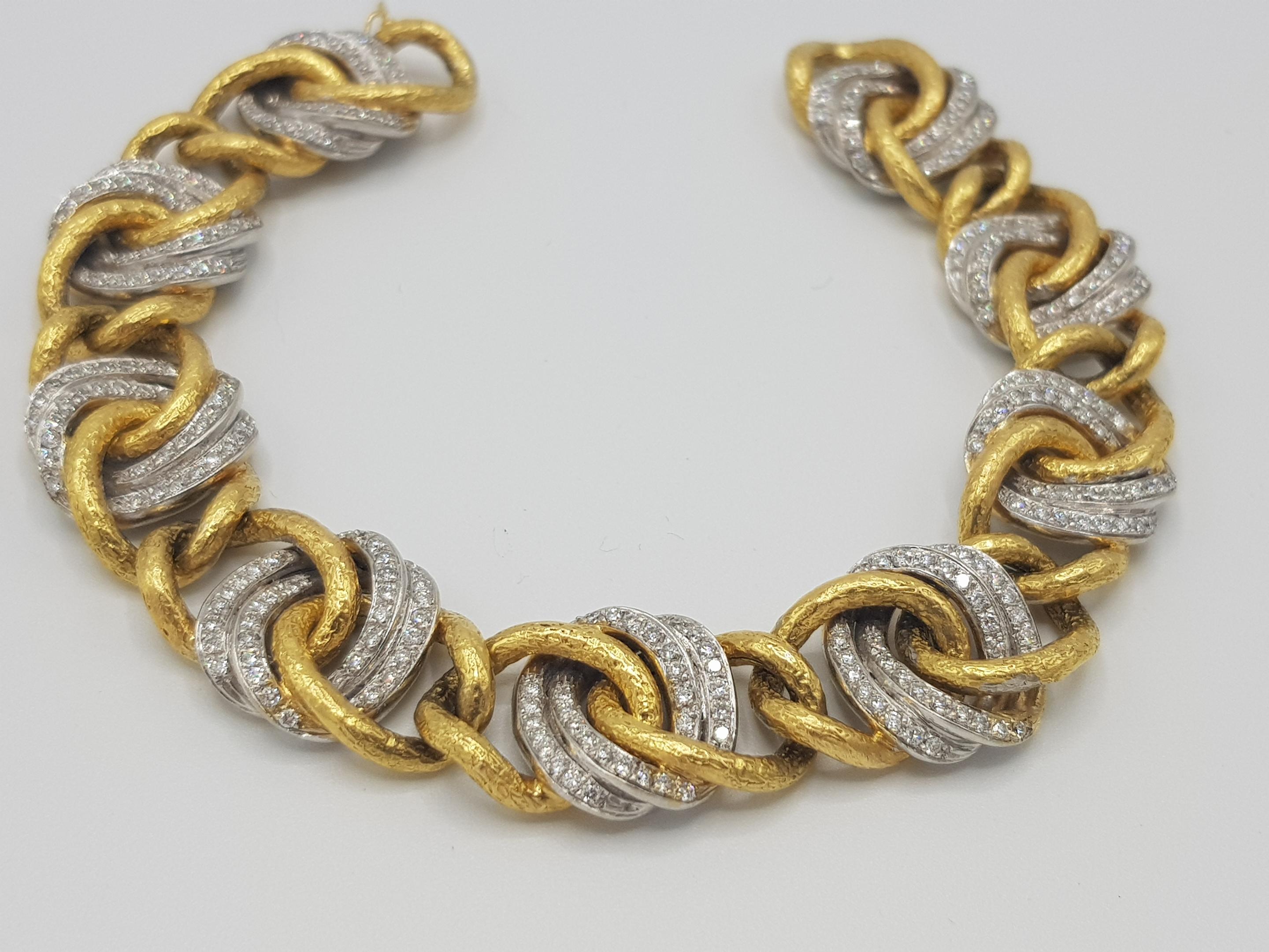 A d'Avossa Bracelet in 18Kt White and Yellow Gold, enriched with white diamonds chains that give this piece a special brightness and a joyful movement.

Unique piece.