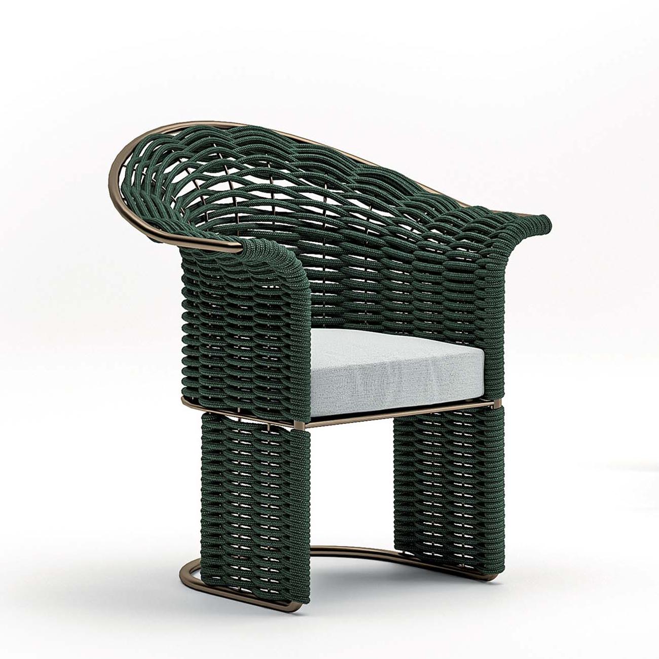 Chair Dawn outdoor with frame structure in stainless steel
in bronze finish, with cushion seat upholstered and covered 
with high quality outdoor fabric. Backrest, armrests and base
made with woven green rope.