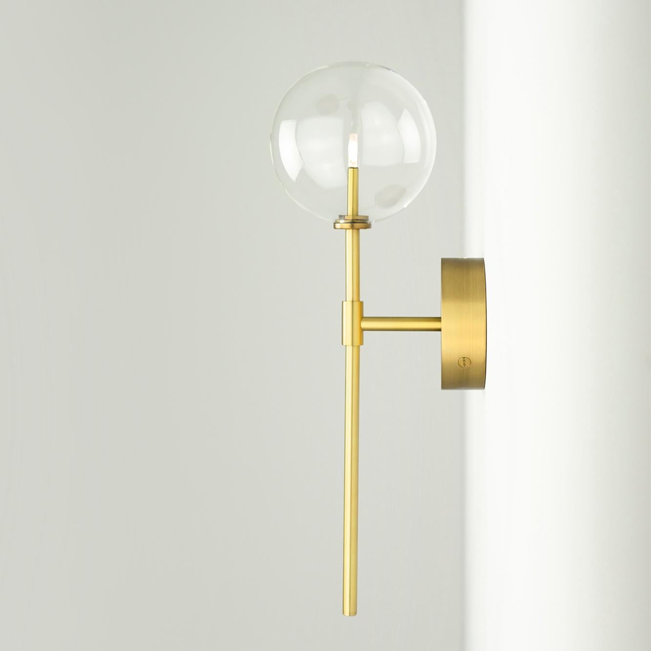 Dawn Single Brass Wall Sconce by Schwung 
Dimensions: W 19 x D 15 x H 50.4 cm
Materials: Natural brass, hand blown glass globes

Finishes available: Black gunmetal, polished nickel
Other sizes available

Schwung is a German word, and loosely