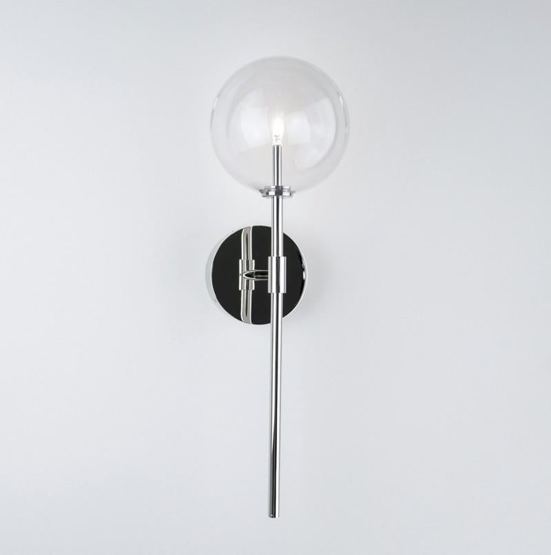 Polished nickel wall sconce by Schwung
Dimensions: D 19.3 x W 15 x H 50.5 cm 
Materials: Solid brass, hand-blown glass globes.
Finish: Polished nickel
Available in finishes: Black gunmetal or natural brass.
All our lamps can be wired according