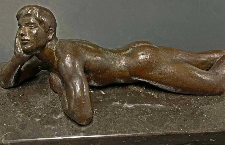 Evocative and beautiful, this highly rare bronze sculpture of a nude male youth, dreamily looking into the distance, was sculpted by Walker Hancock in 1938. The artist is best known for his massive sculpture of an angel holding a dying, half-nude