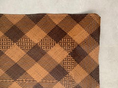 Stuoia della tribù Dayak con motivo a scacchi, Kalimantan, Indonesia