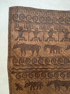 Tappeto della tribù Dayak con motivi tribali a spirale, animali e umani, Borneo, Indonesia