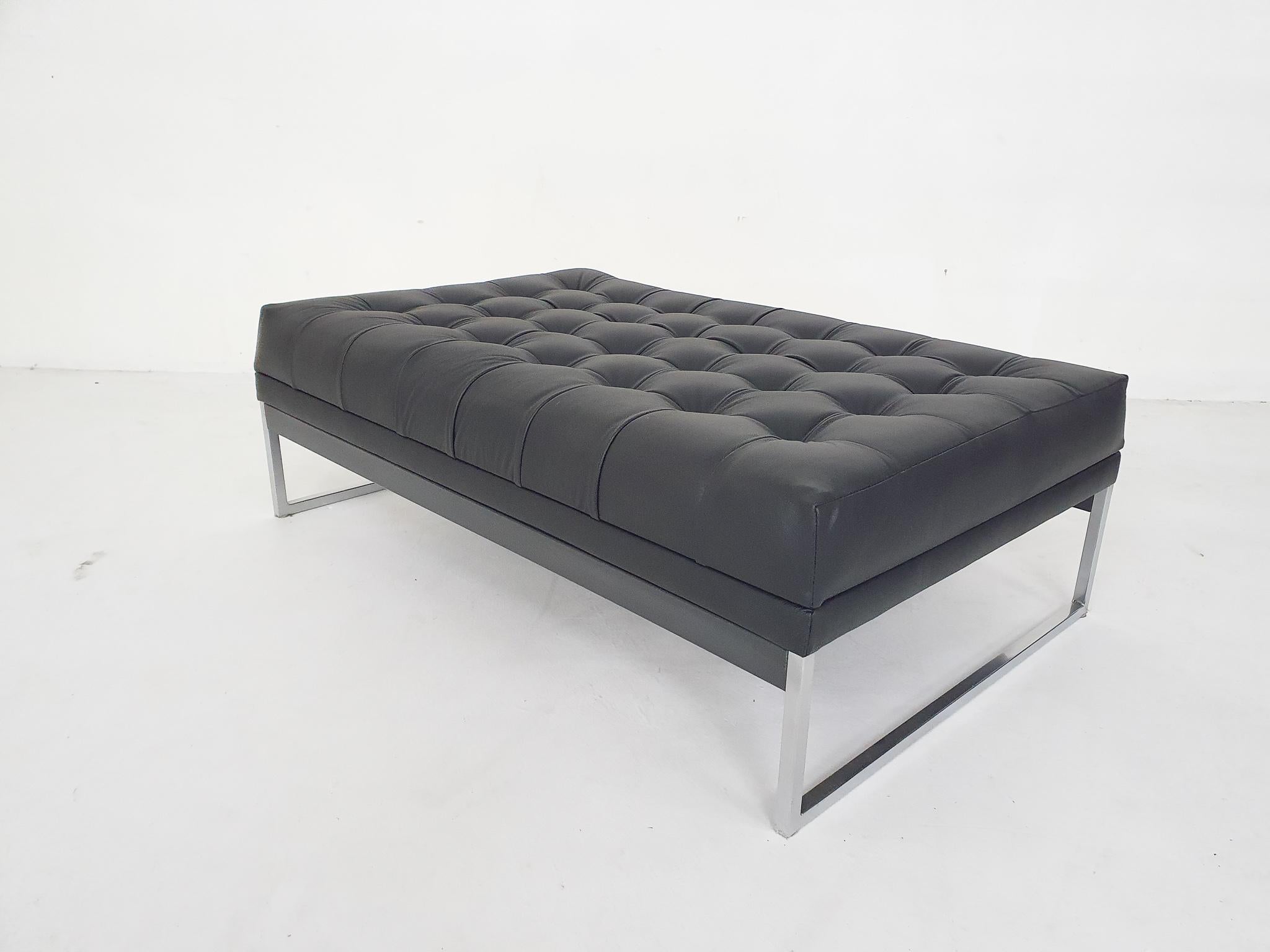 Metal bench or daybed with new black leather upholstery and new filling. Manufactured by AP originals.
We have two available, one is marked at the bottom.

