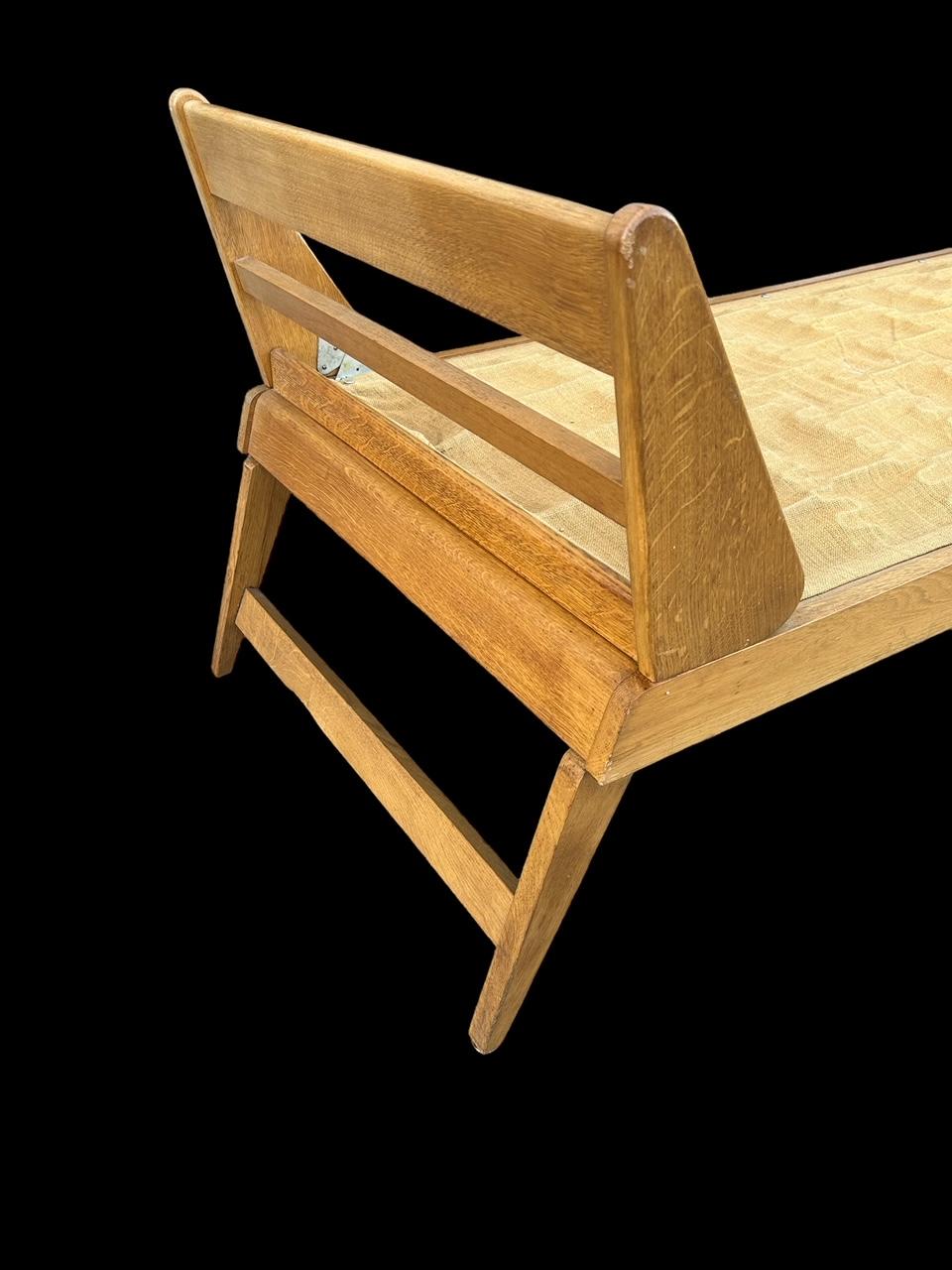 Oak daybed by René Jean Caillette from the 1950's For Sale