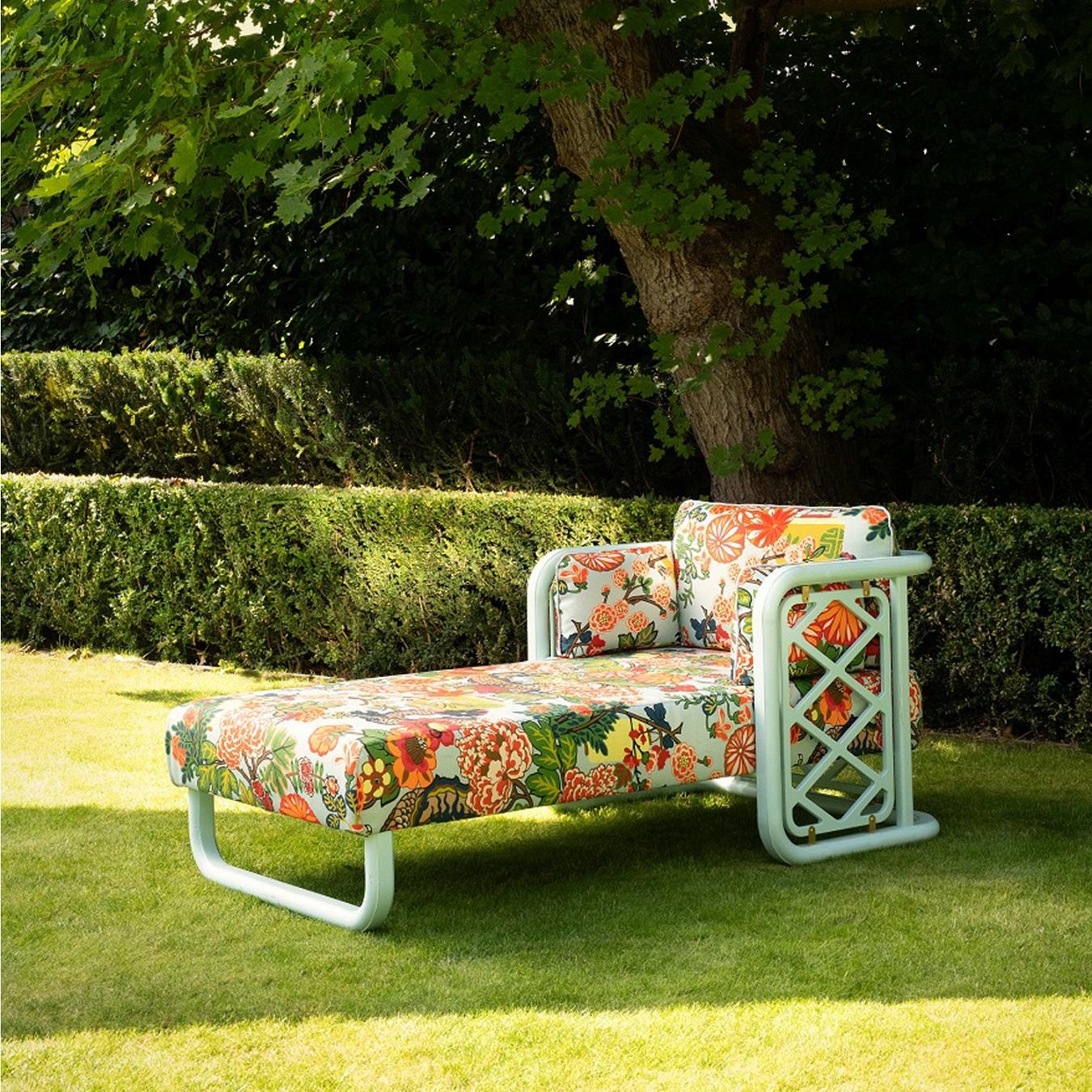 Aquamarine lacquered beech structure, decorative panels with trellis design. Outdoor coating. 1 backrest cushion and 2 armrest cushions. 
It is a piece of furniture made by hand by the craftsmen of Moissonnier, French cabinetmaker since 1885. Our