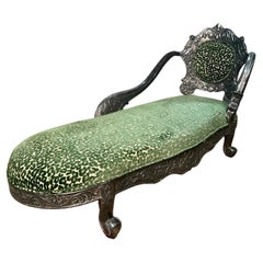 Daybed with silver plated carved wood decor on the backrest