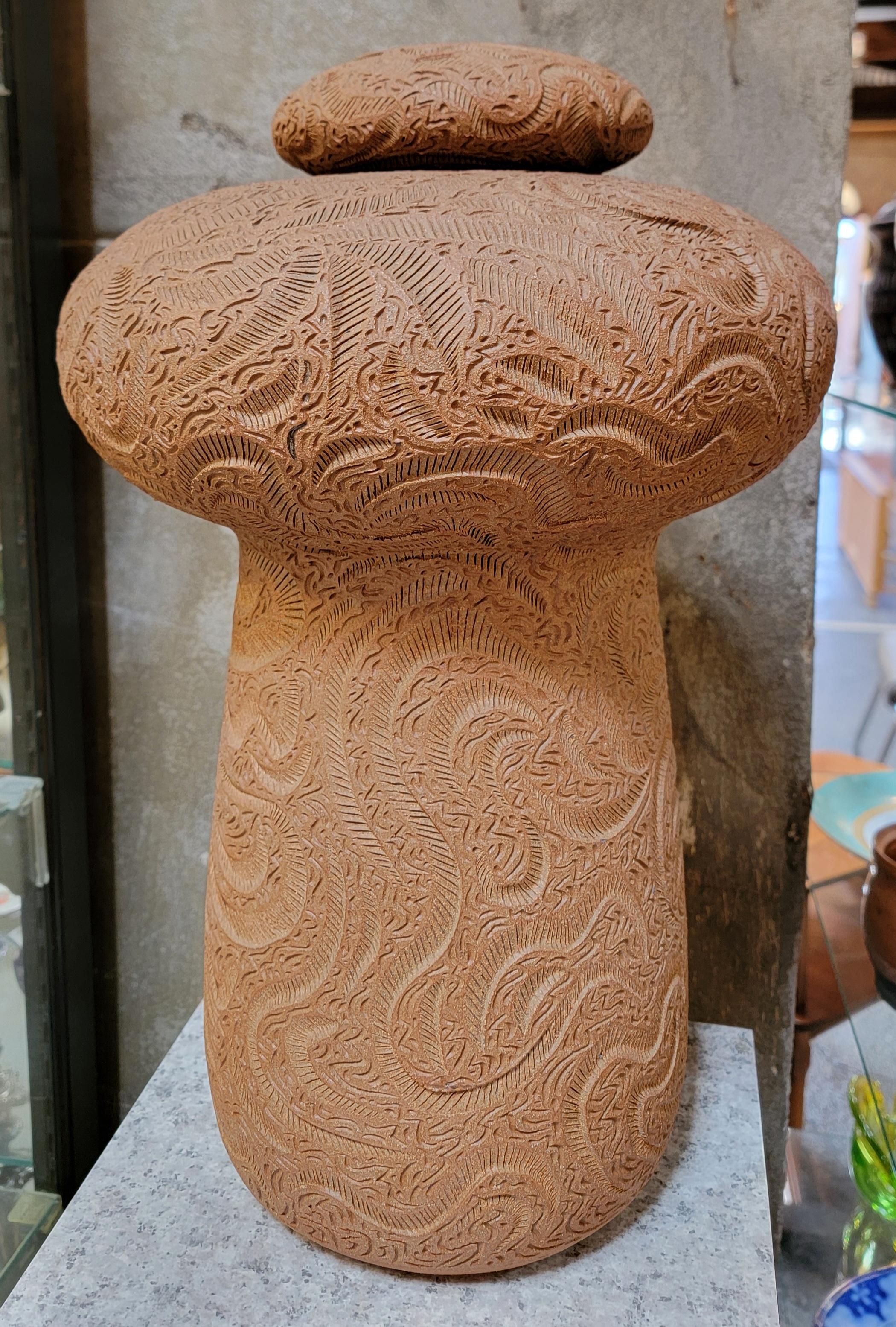 Impressive, large-scale studio pot by California Artist Dayle Rushall. Exceptional detail to hand incised decoration. Stands 19.5 inches tall. Signed and dated on base. Excellent original condition.