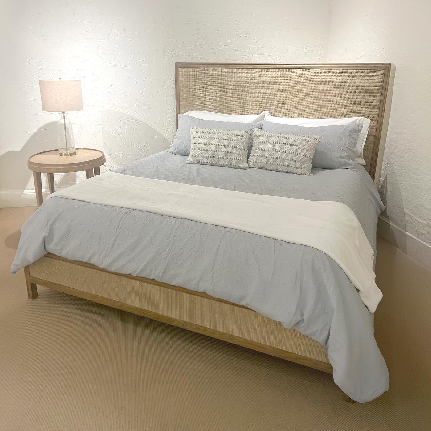 The Modern Bed is designed to seamlessly blend with your personal style and preferences. The clean lines and light ceruse finish create a sense of serenity and balance, making it an ideal choice for creating a tranquil sleeping environment.

The