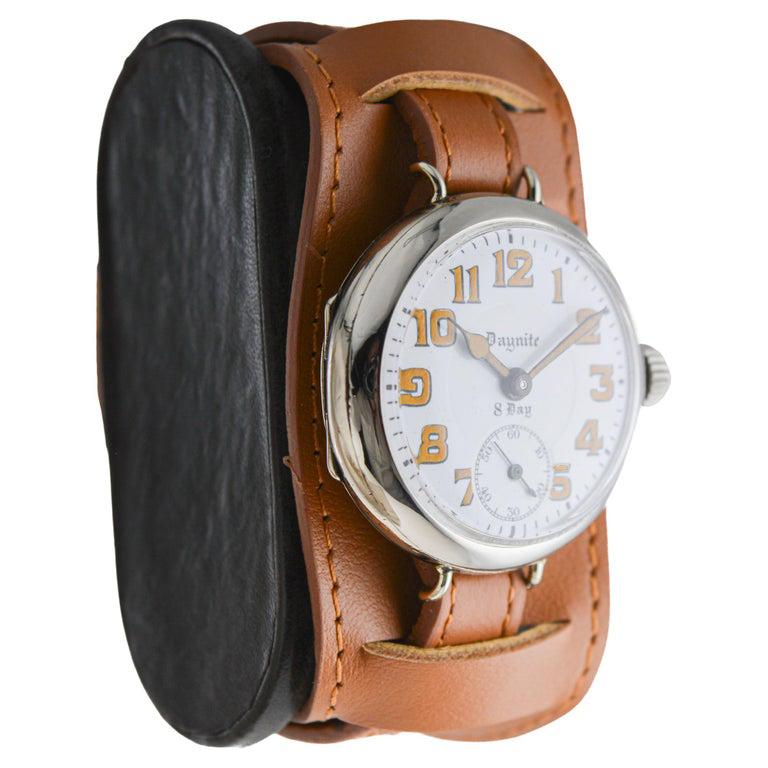 FACTORY / HOUSE: Daynite / Hebdomas
STYLE / REFERENCE: Art Deco / Campaign 8 Day
METAL / MATERIAL: Nickel 
CIRCA / YEAR: 1915
DIMENSIONS / SIZE: Length 40mm X Diameter 34mm
MOVEMENT / CALIBER: Manual Winding / 15 Jewels / Hebdomas
DIAL / HANDS: