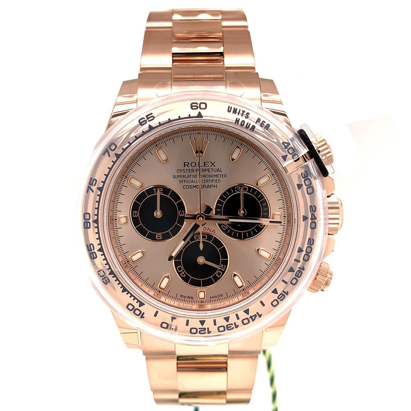 This Rolex Oyster Perpetual Cosmograph Daytona in 18 ct rose gold, with white mother-of-pearl, diamond-set dial, and an Oyster bracelet features an 18 ct rose gold bezel with engraved tachymetric scale. This chronograph was designed to be the