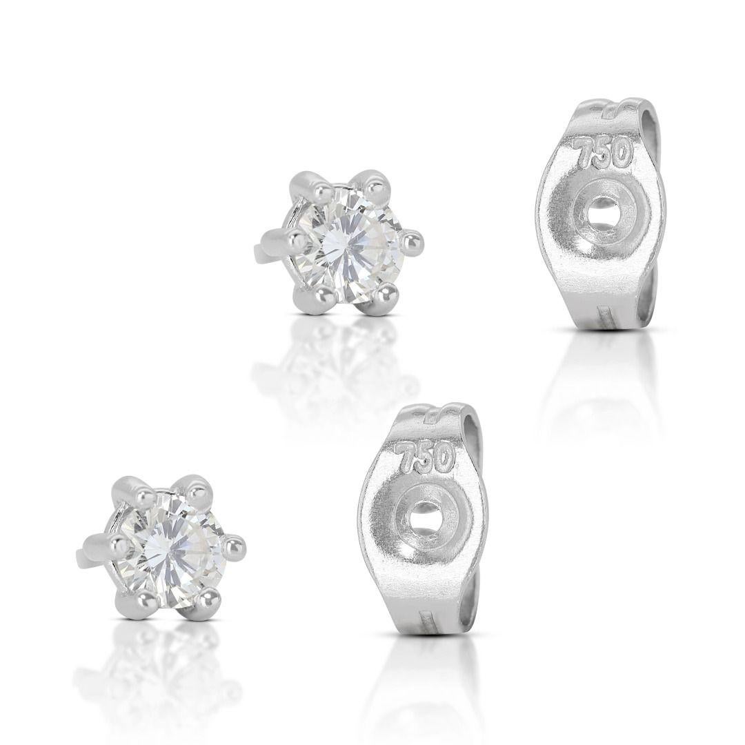 Dazzling 0.14ct Solitaire Diamond Stud Earrings set in 18K White Gold For Sale 1