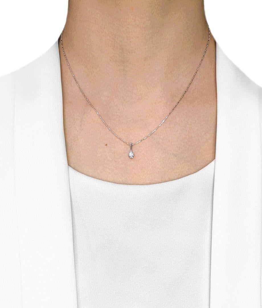 Elevate your everyday style with this dazzling diamond pendant, meticulously crafted in radiant 18K white gold. At its heart shines a brilliant 0.25ct natural round brilliant diamond, boasting an impressive F-G color grade and VS clarity, ensuring