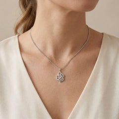 Abbagliante ciondolo con flusso di diamanti da 0,61 carati in oro bianco 9K