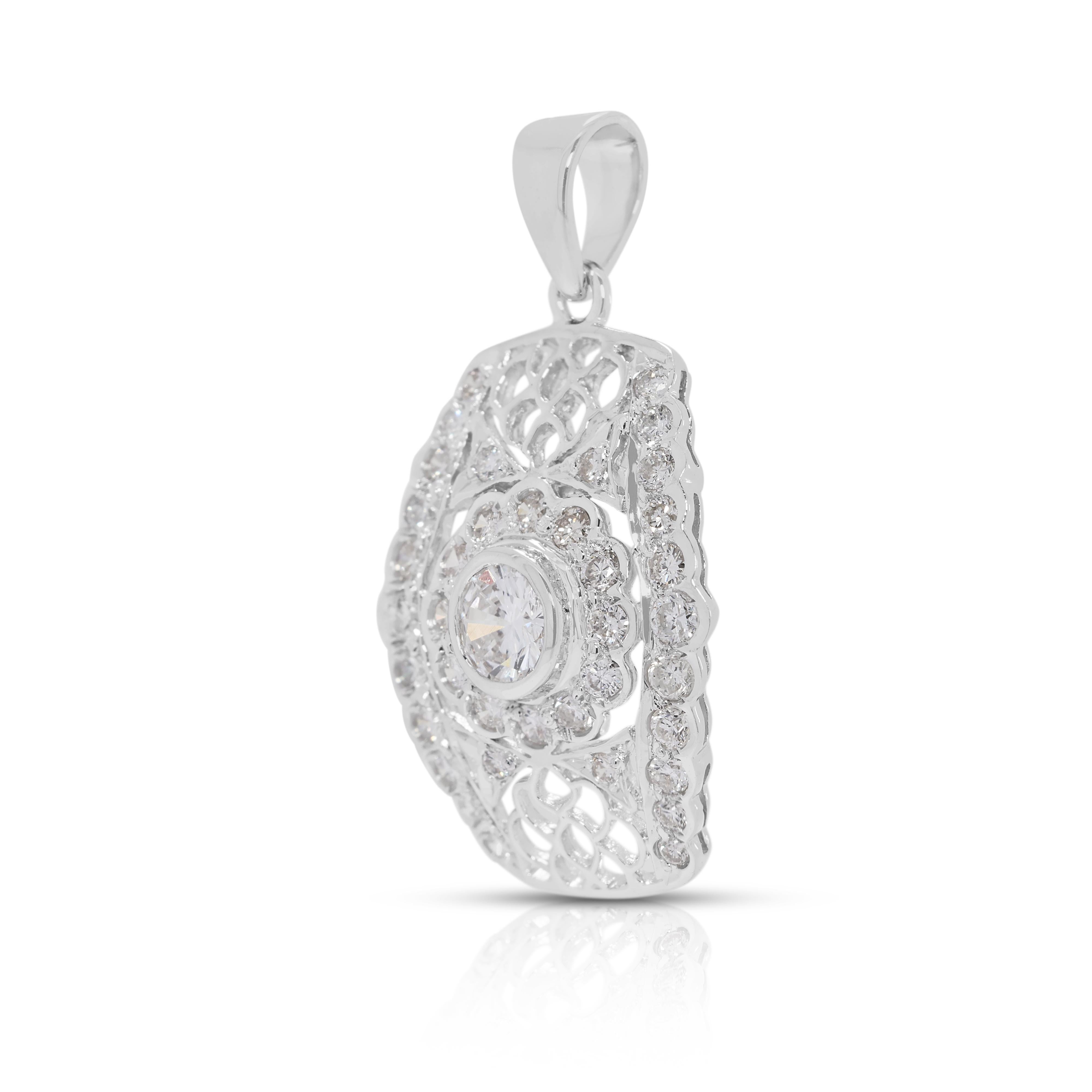 Éblouissant pendentif filigrane en or blanc 18 carats orné d'un diamant naturel de 0,63 ct. Excellent état - En vente à רמת גן, IL