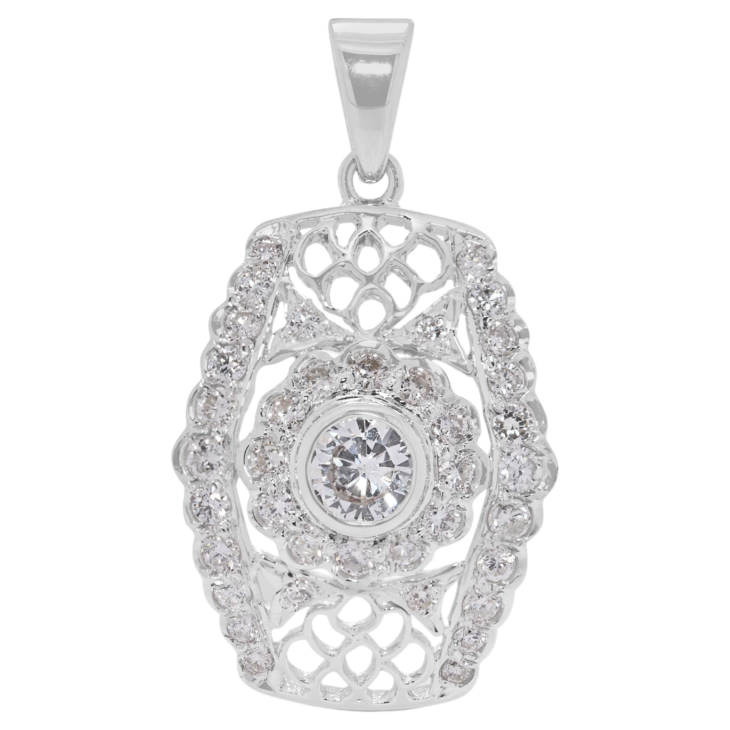 Éblouissant pendentif filigrane en or blanc 18 carats orné d'un diamant naturel de 0,63 ct. en vente
