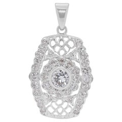 Éblouissant pendentif filigrane en or blanc 18 carats orné d'un diamant naturel de 0,63 ct.