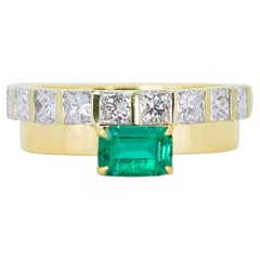 Dazzling 0.65ct Emerald Cut Emerald Ring Dazzling 0.65ct Emerald Cut Emerald Ring