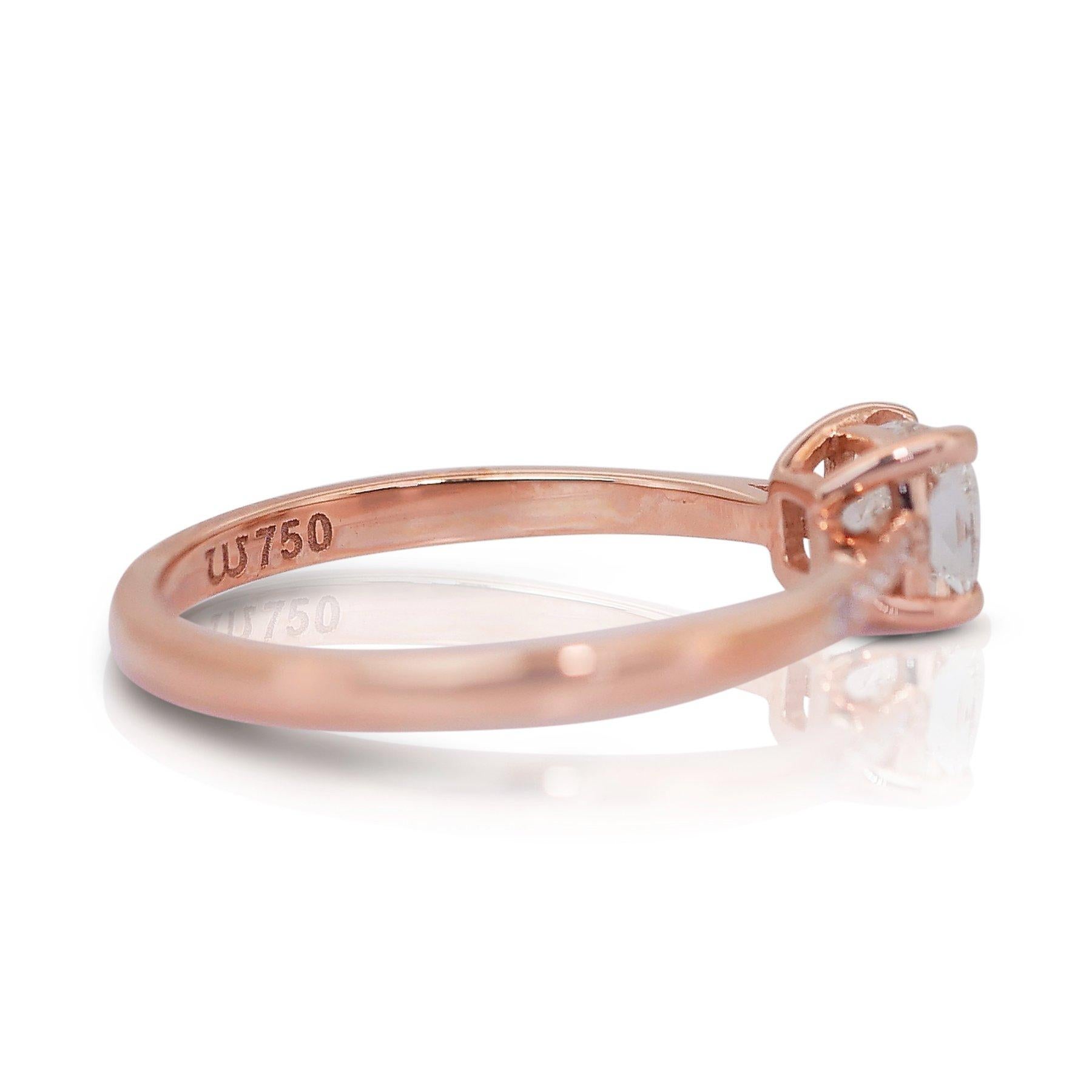 Dazzling 0.70ct Double Excellent Ideal Cut Diamonds Pave Ring in 18k Rose Gold - GIA Certified

This 18k rose gold diamond pave ring is a blend of subtle luxury and modern elegance. At its center is a stunning 0.60-carat cushion-cut diamond,