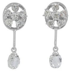 Boucles d
oreilles pendantes en or blanc 12 carats avec diamant brillant et taille rose de 0,70 ct.