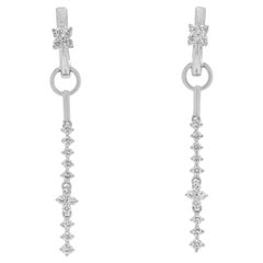 Boucles d'oreilles pendantes éblouissantes en or blanc 18 carats et diamant naturel de 0,72 ct.